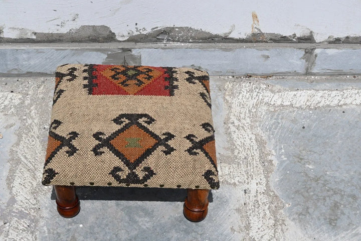 Handmade Southwestern Kilim Ottoman Footstool | Wool Jute Upholstered Tribal Accent Stool with Solid Wooden Legs for Living Room