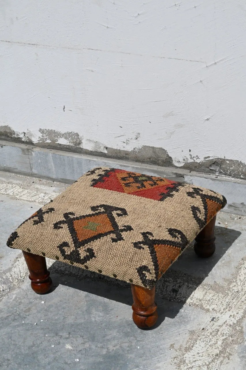 Handmade Southwestern Kilim Ottoman Footstool | Wool Jute Upholstered Tribal Accent Stool with Solid Wooden Legs for Living Room
