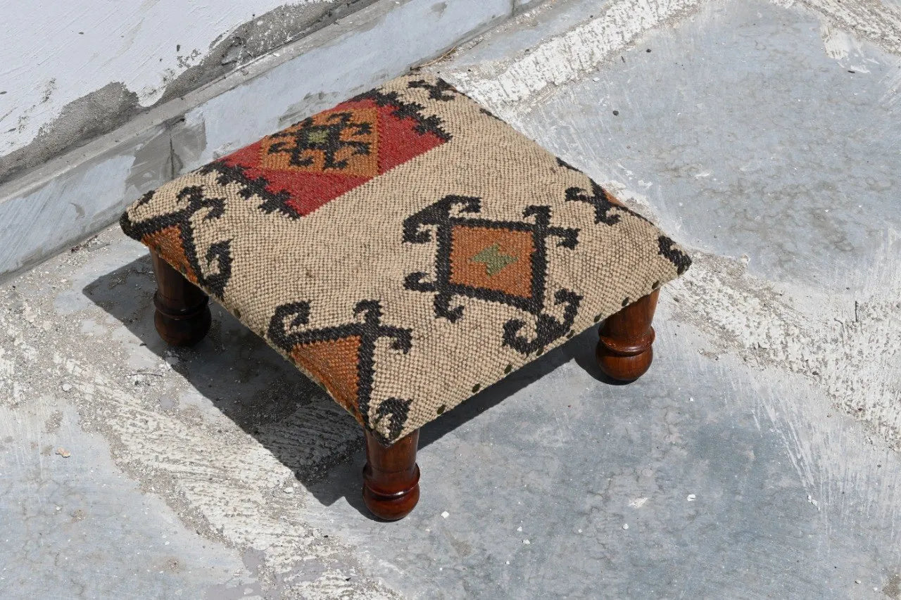 Handmade Southwestern Kilim Ottoman Footstool | Wool Jute Upholstered Tribal Accent Stool with Solid Wooden Legs for Living Room