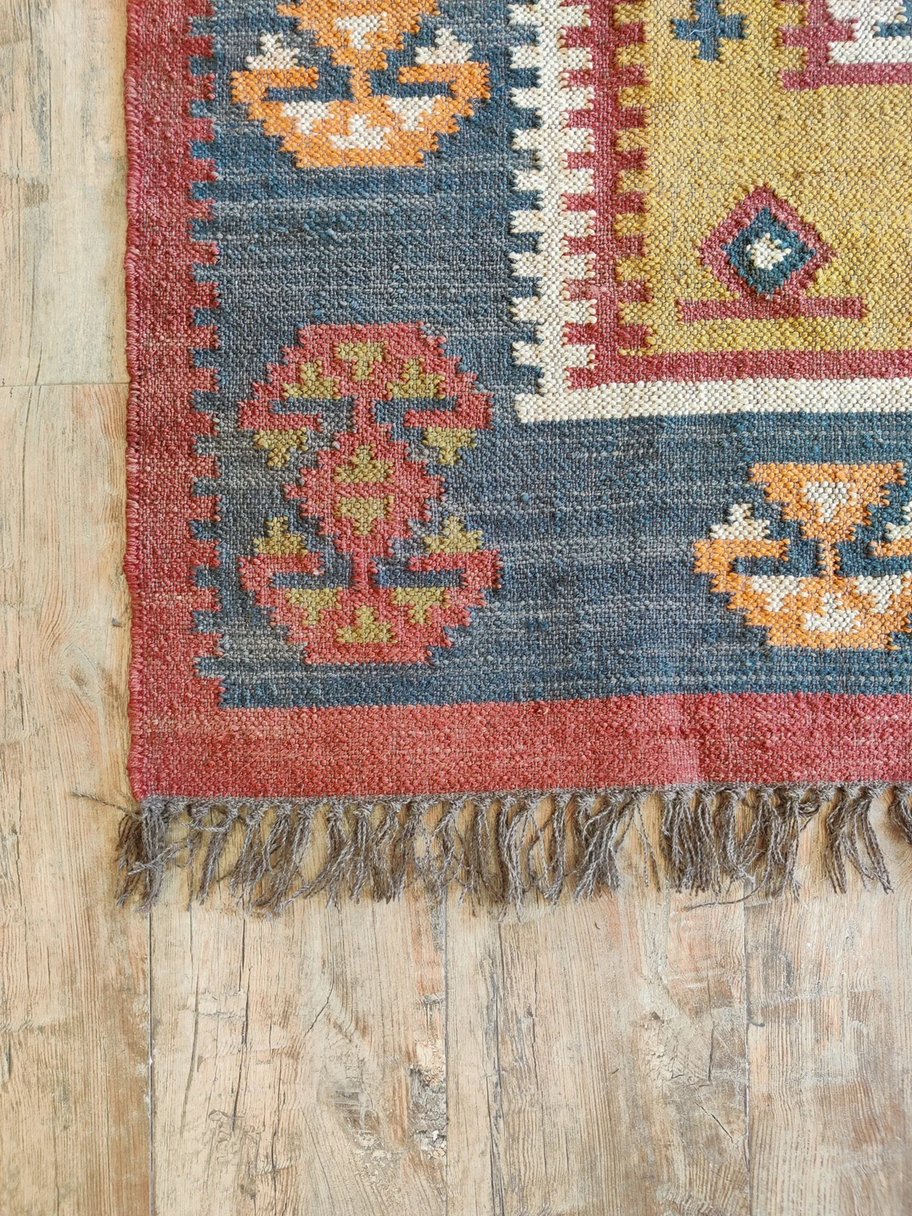 Traditional Rajasthani Wool Jute Kilim Rug – Handwoven Tribal Geometric Pattern in Rust, Mustard & Indigo