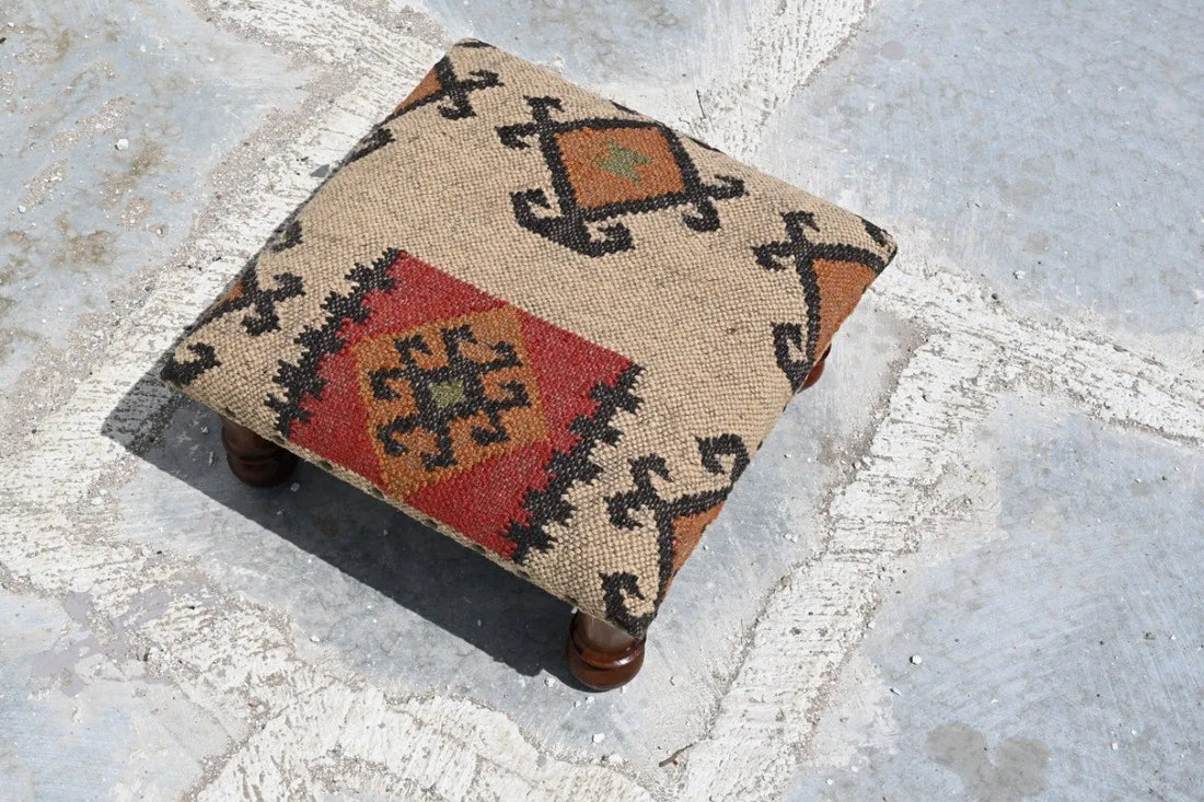 Handmade Southwestern Kilim Ottoman Footstool | Wool Jute Upholstered Tribal Accent Stool with Solid Wooden Legs for Living Room