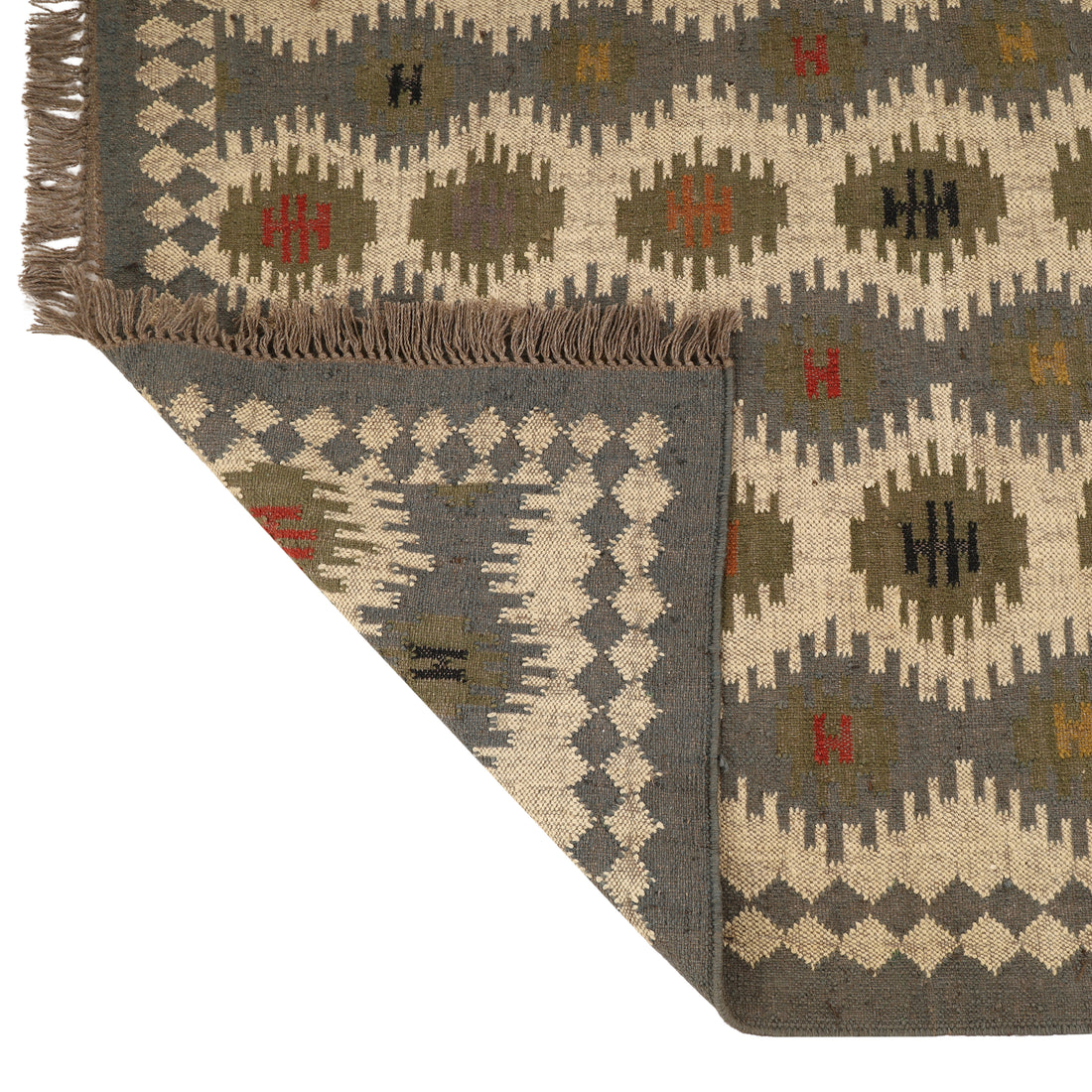 Kilim wool jute rug, handwoven with a tribal geometric pattern and fringe