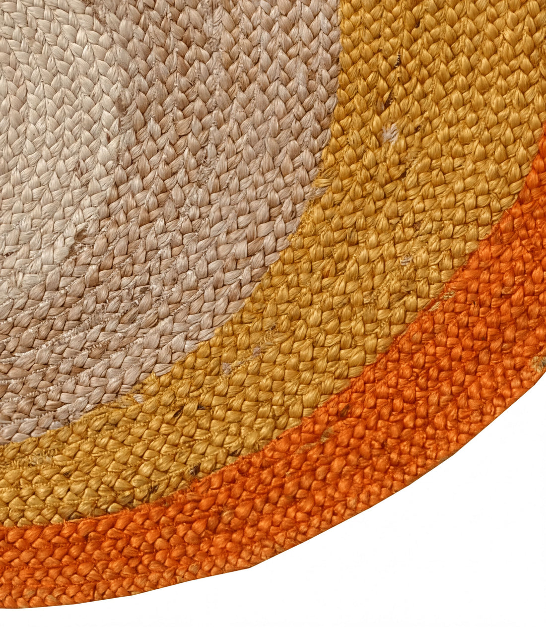 a close-up view of a woven mat with a striped pattern in shades of orange and beige.