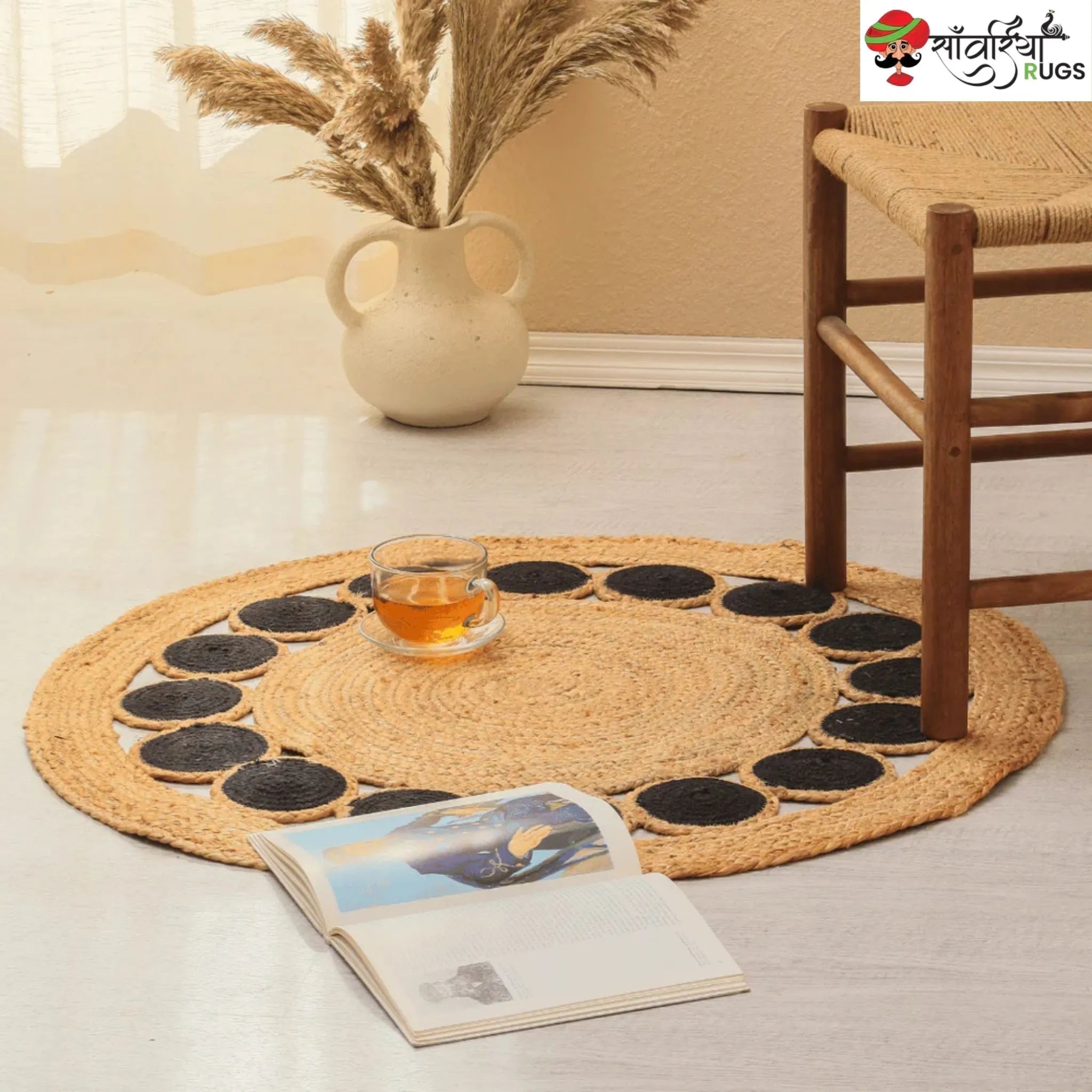 Handmade Round Braided Jute Rug with Black Geometric Tikki Pattern