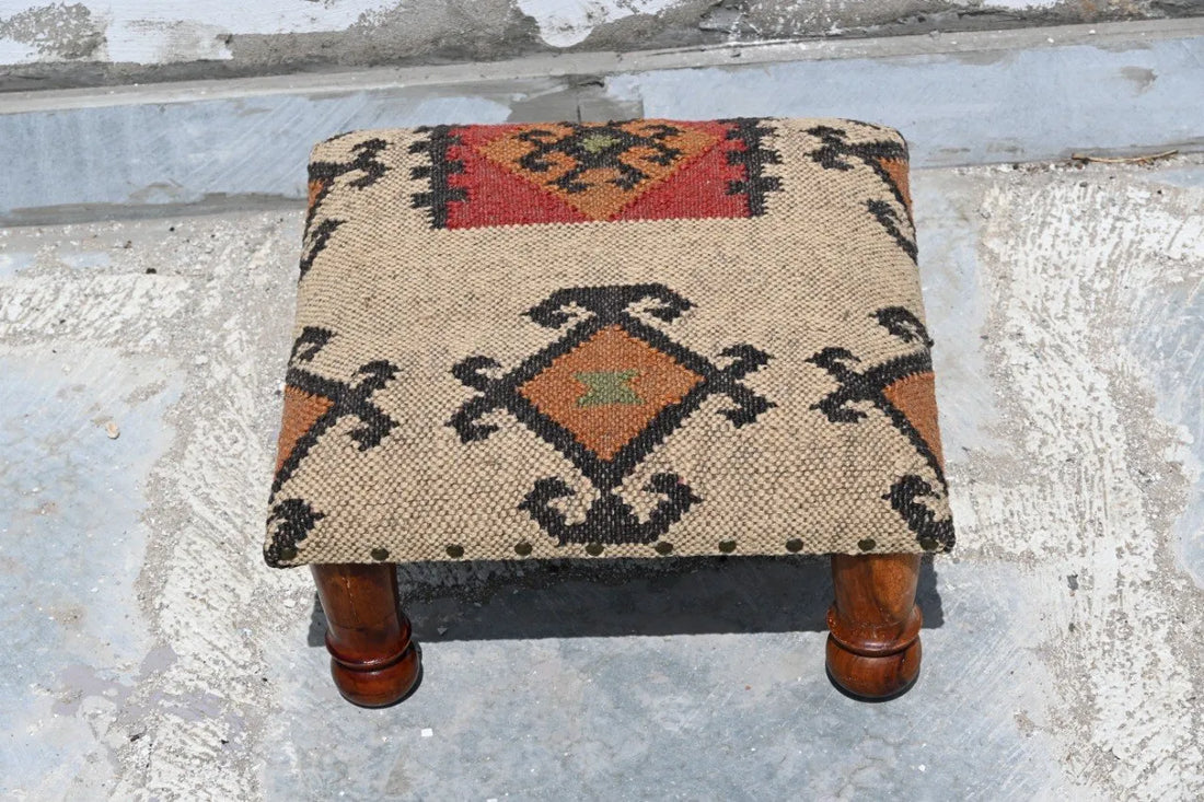 Handmade Southwestern Kilim Ottoman Footstool | Wool Jute Upholstered Tribal Accent Stool with Solid Wooden Legs for Living Room