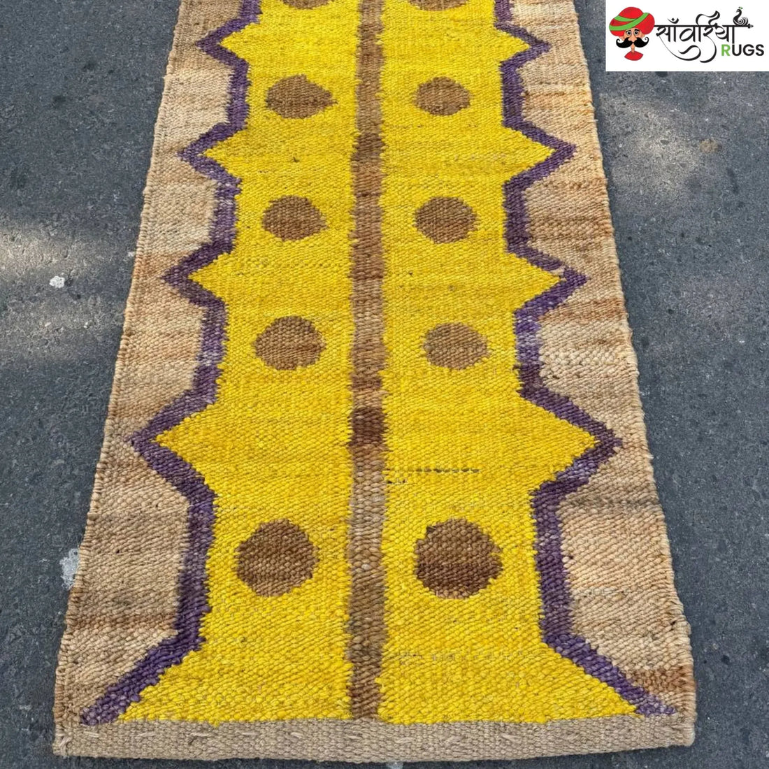 Yellow jute runner rug with geometric brown and purple pattern