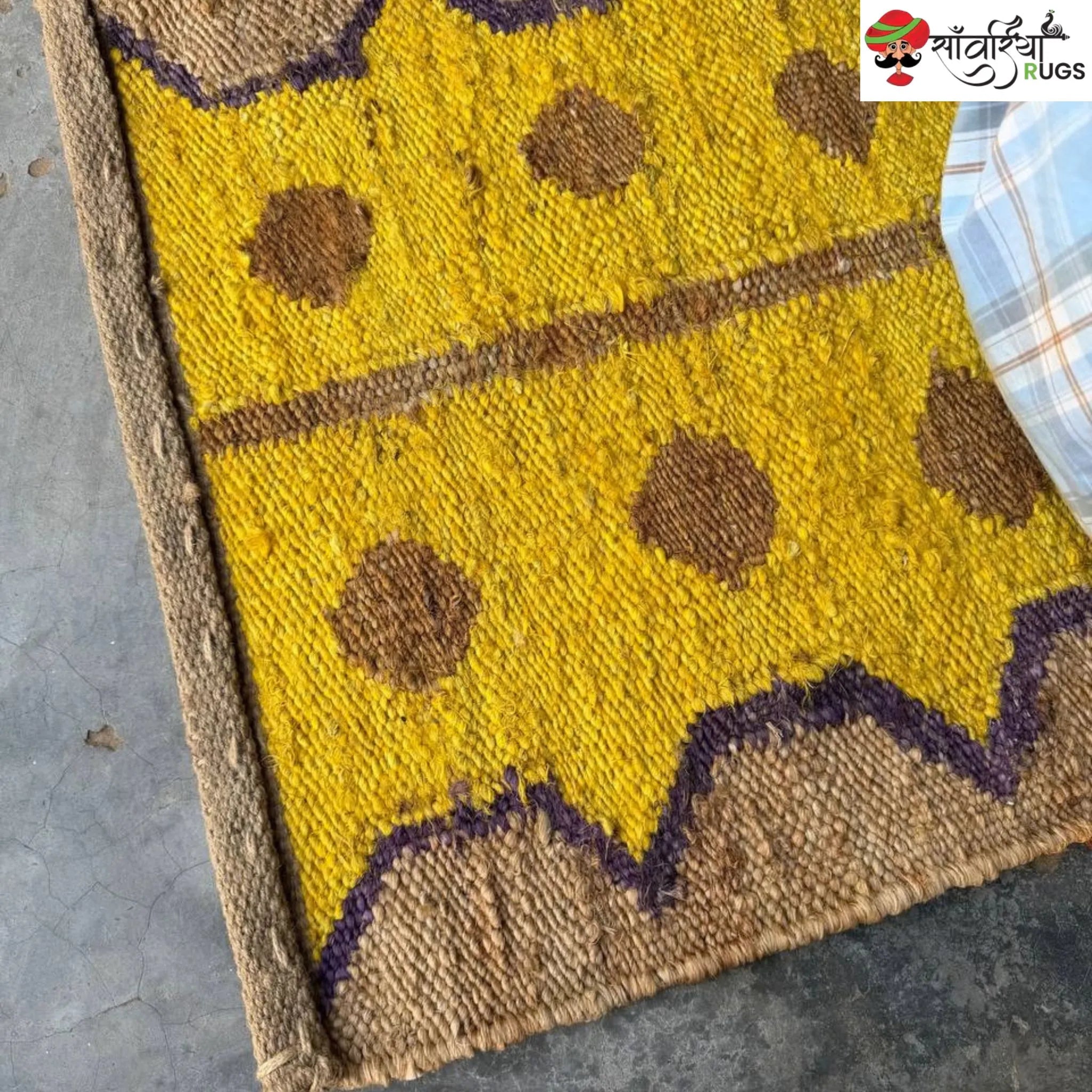 Yellow jute runner rug with geometric brown and purple pattern