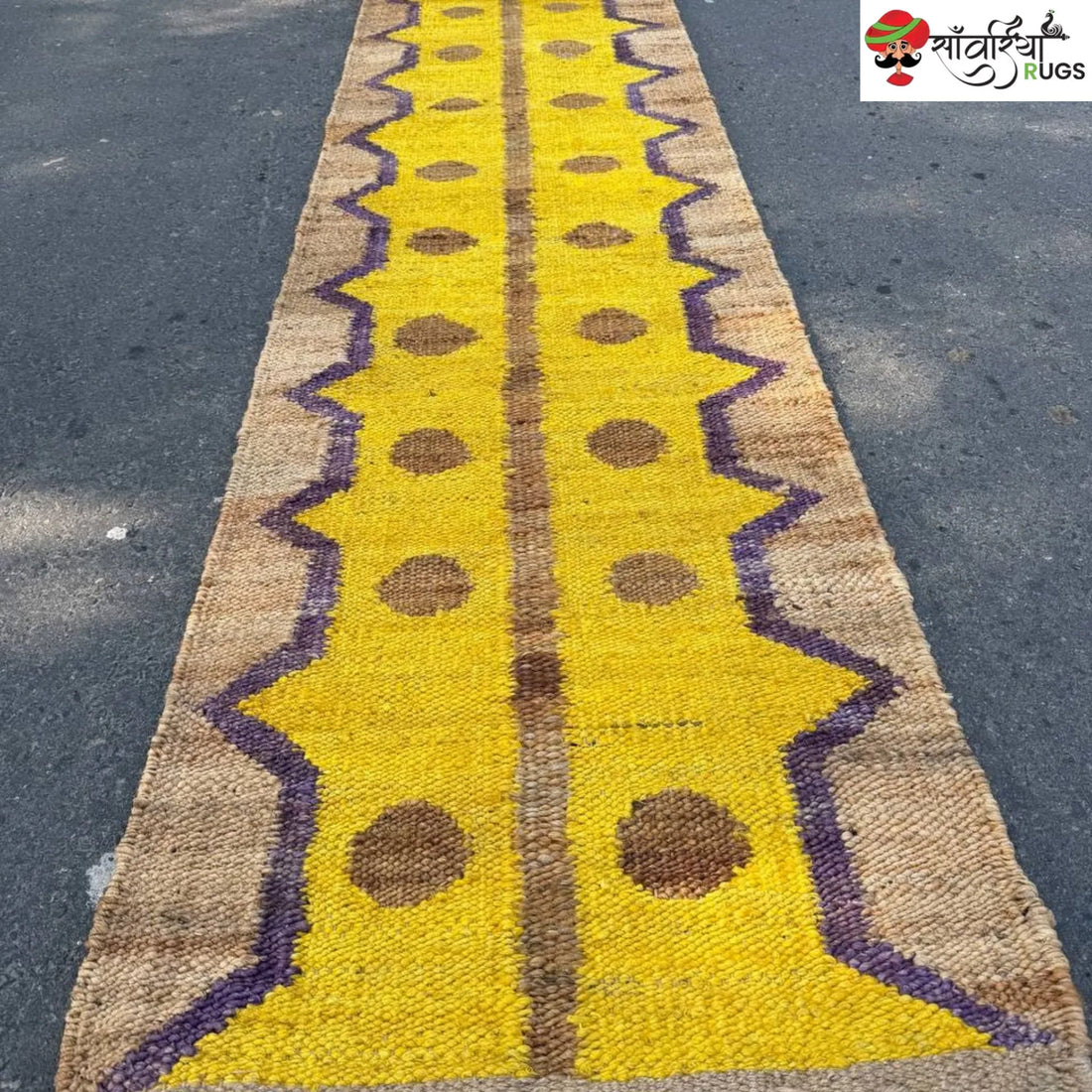 Yellow jute runner rug with geometric brown and purple pattern