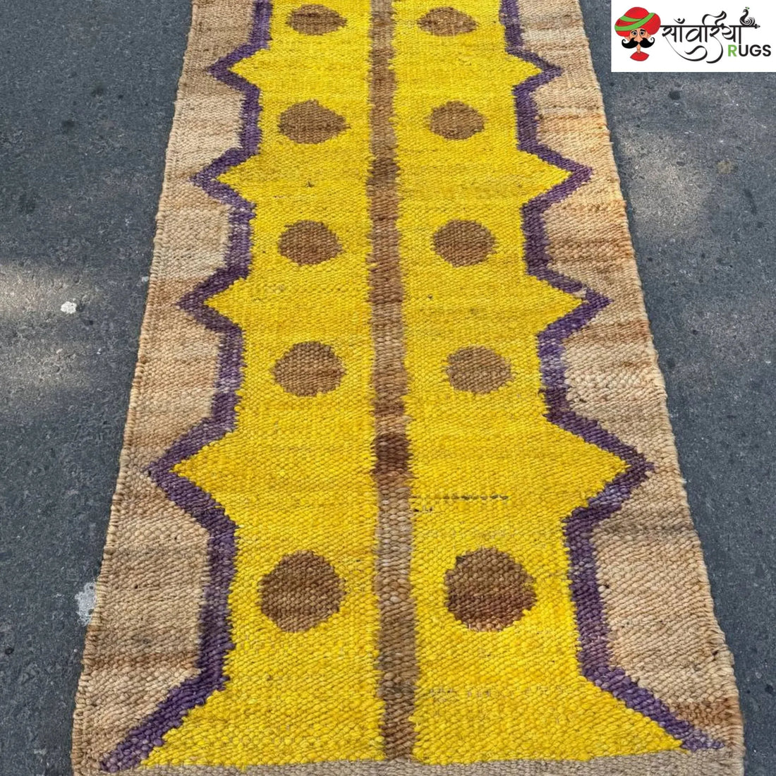 Yellow jute runner rug with geometric brown and purple pattern