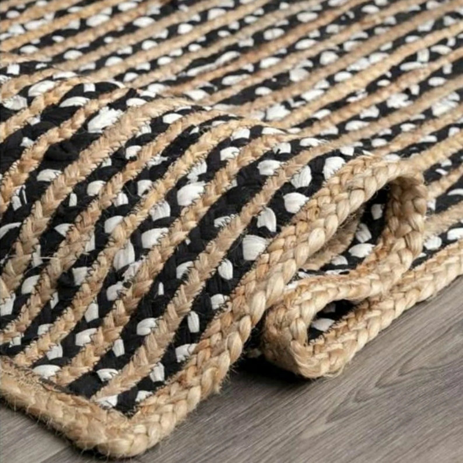 Braided Handmade Natural Jute Rug with Black Chindi Border – Eco-Friendly Vegan Rectangle Rug | Handwoven by Sanwariya Rugs Export