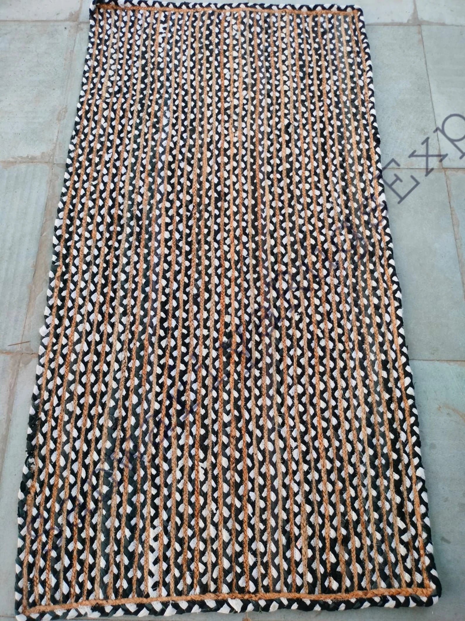 Braided Handmade Natural Jute Rug with Black Chindi Border – Eco-Friendly Vegan Rectangle Rug | Handwoven by Sanwariya Rugs Export