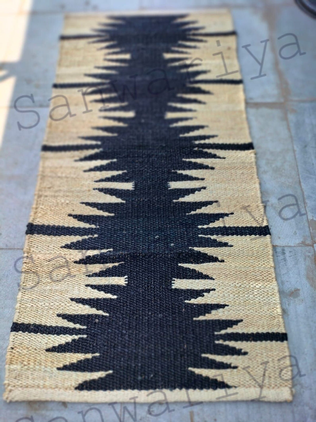 Handwoven Jute Runner Rug with Black Zig Zag Pattern