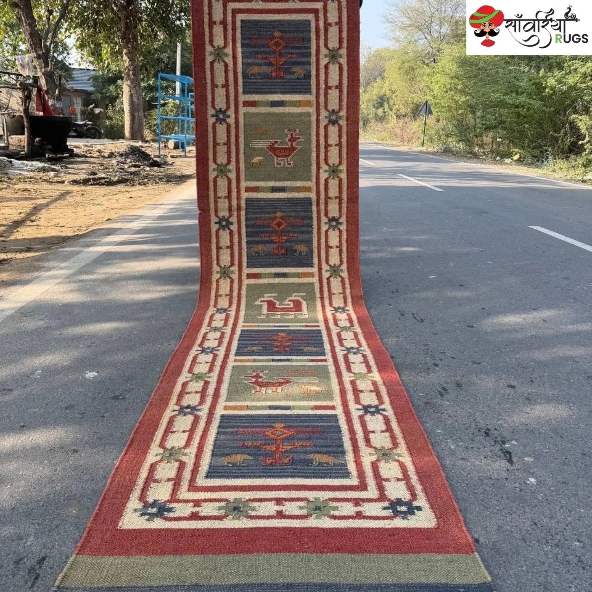 Handwoven kilim runner rug with geometric and animal motifs