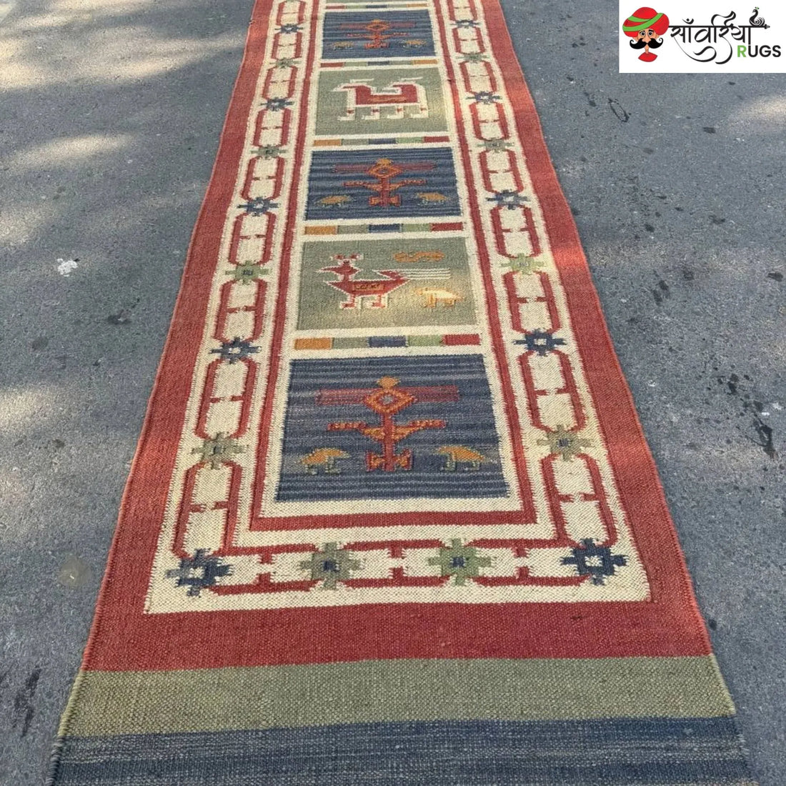 Handwoven kilim runner rug with geometric and animal motifs