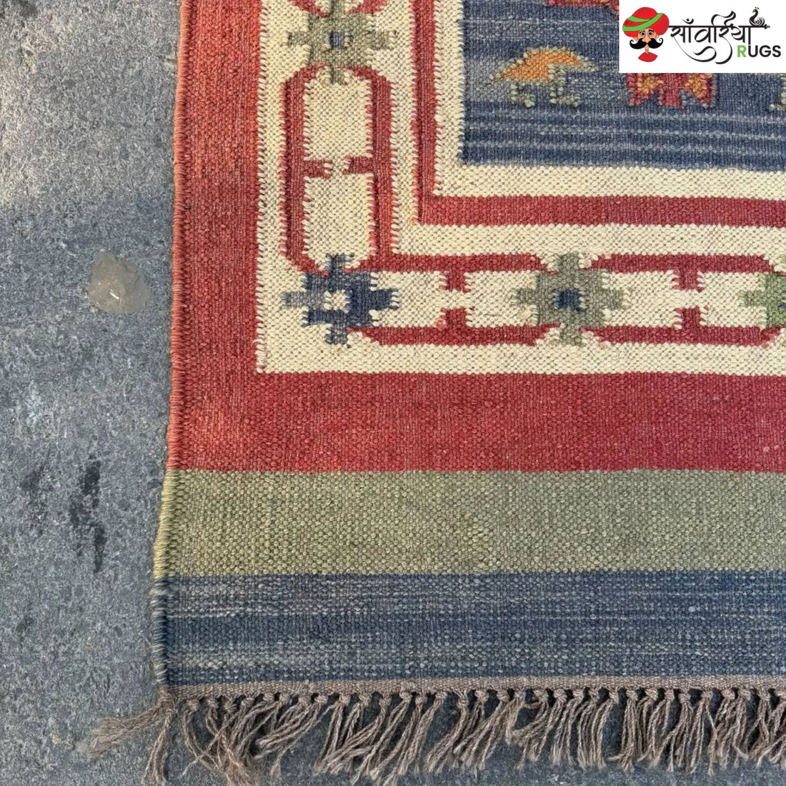 Handwoven kilim runner rug with geometric and animal motifs