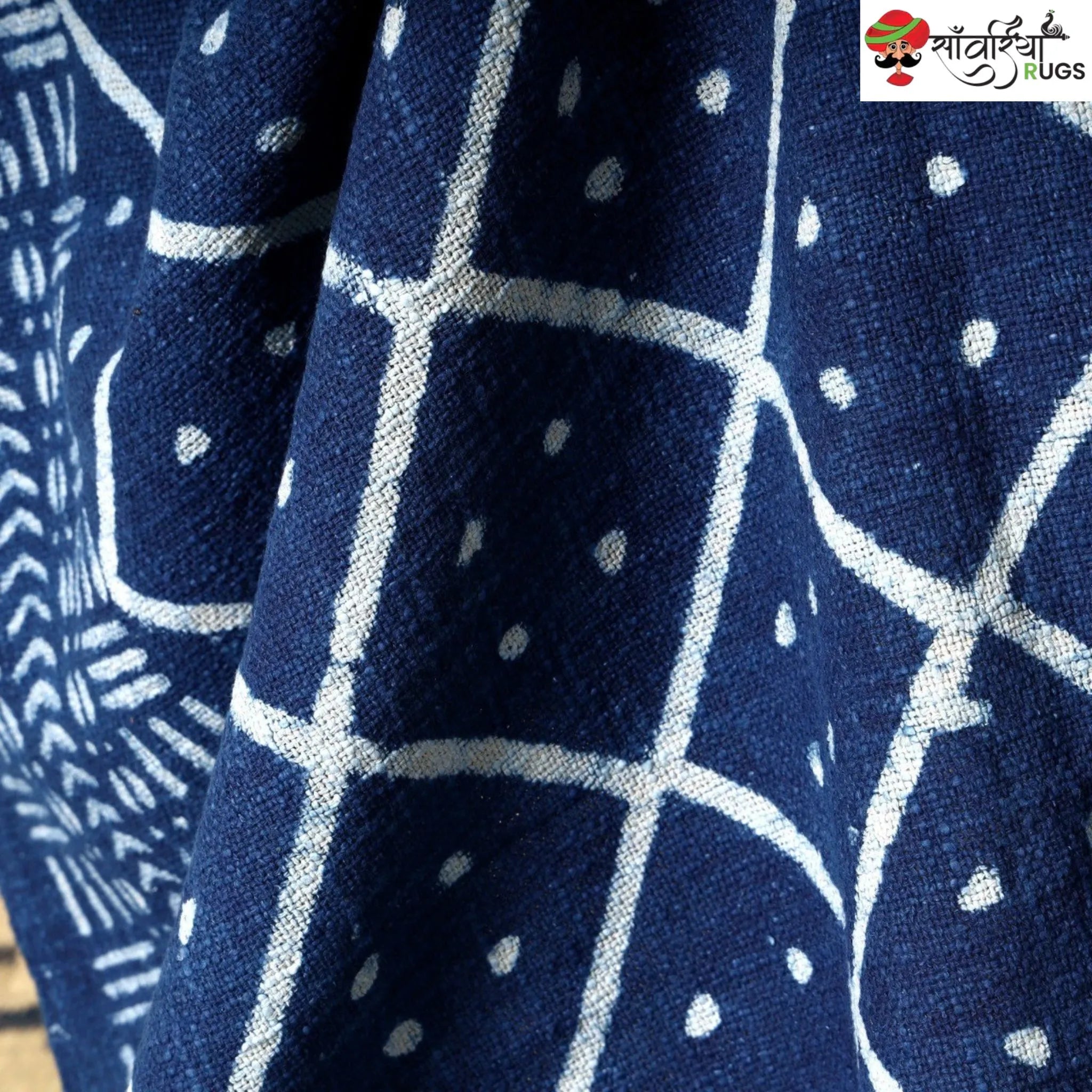 Hand block printed cotton throw blanket with geometric pattern