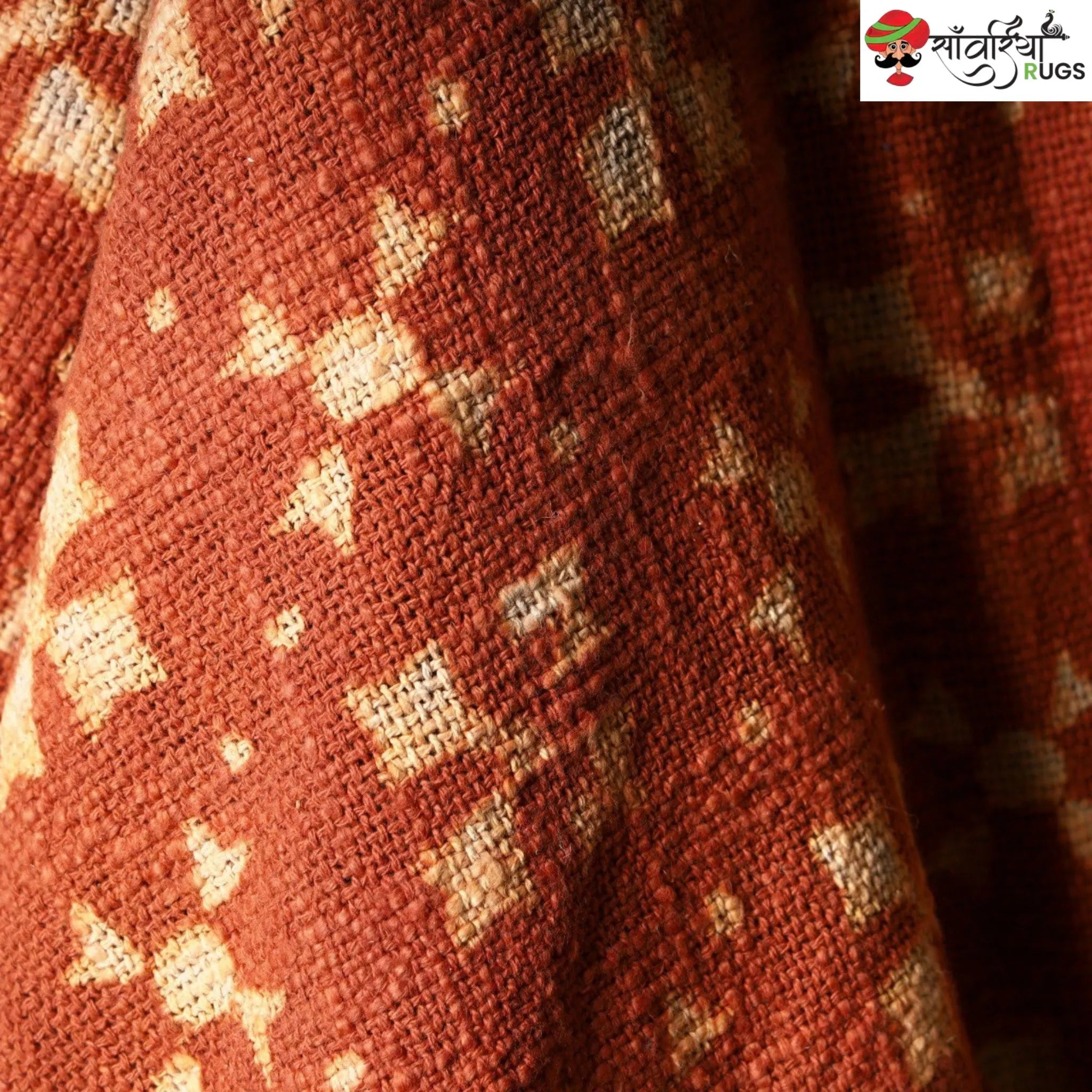 Orange cotton throw blanket with traditional block print design