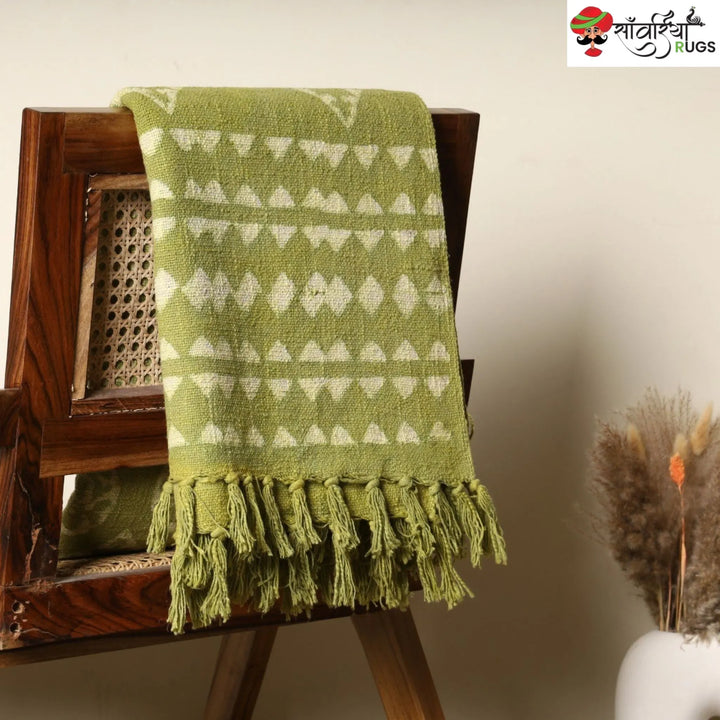 Green cotton throw blanket with traditional block print design