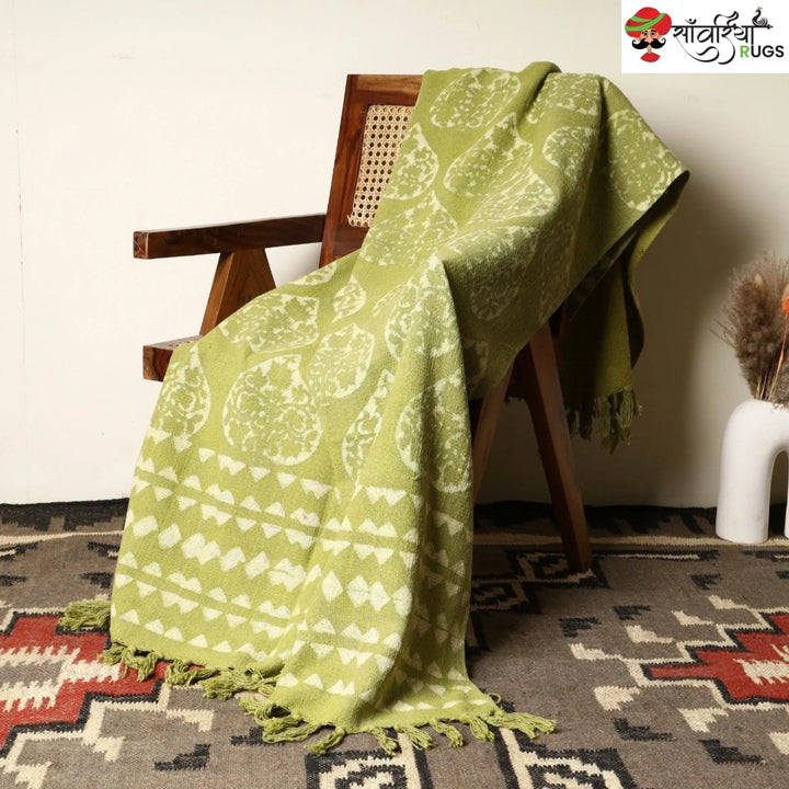 Green cotton throw blanket with traditional block print design