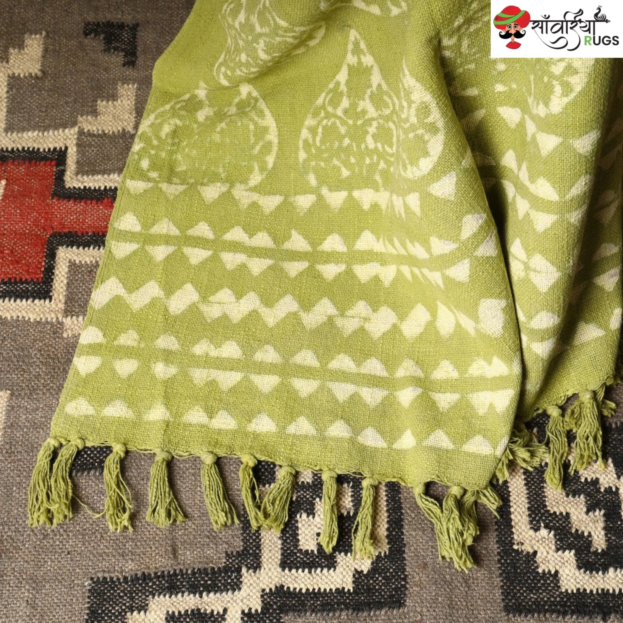 Green cotton throw blanket with traditional block print design