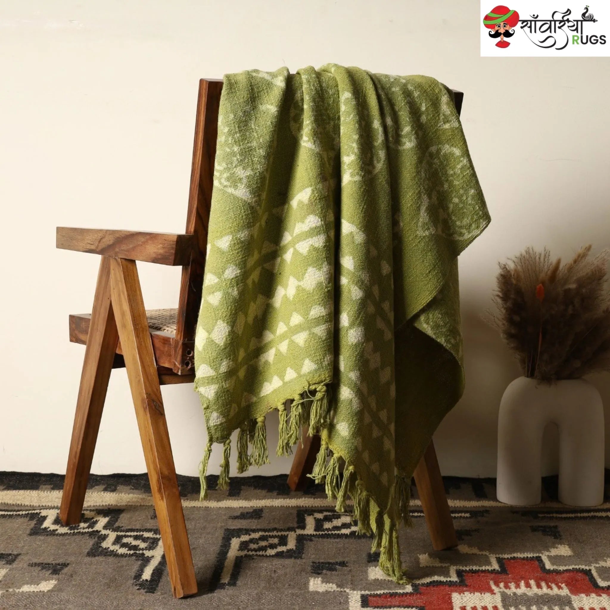 Green cotton throw blanket with traditional block print design