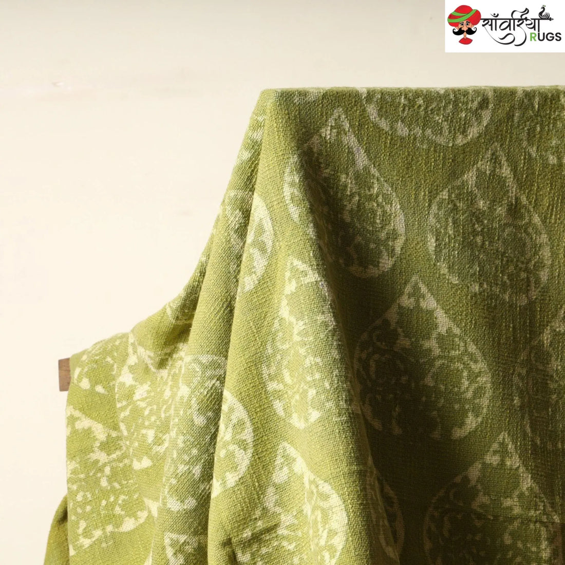 Green cotton throw blanket with traditional block print design