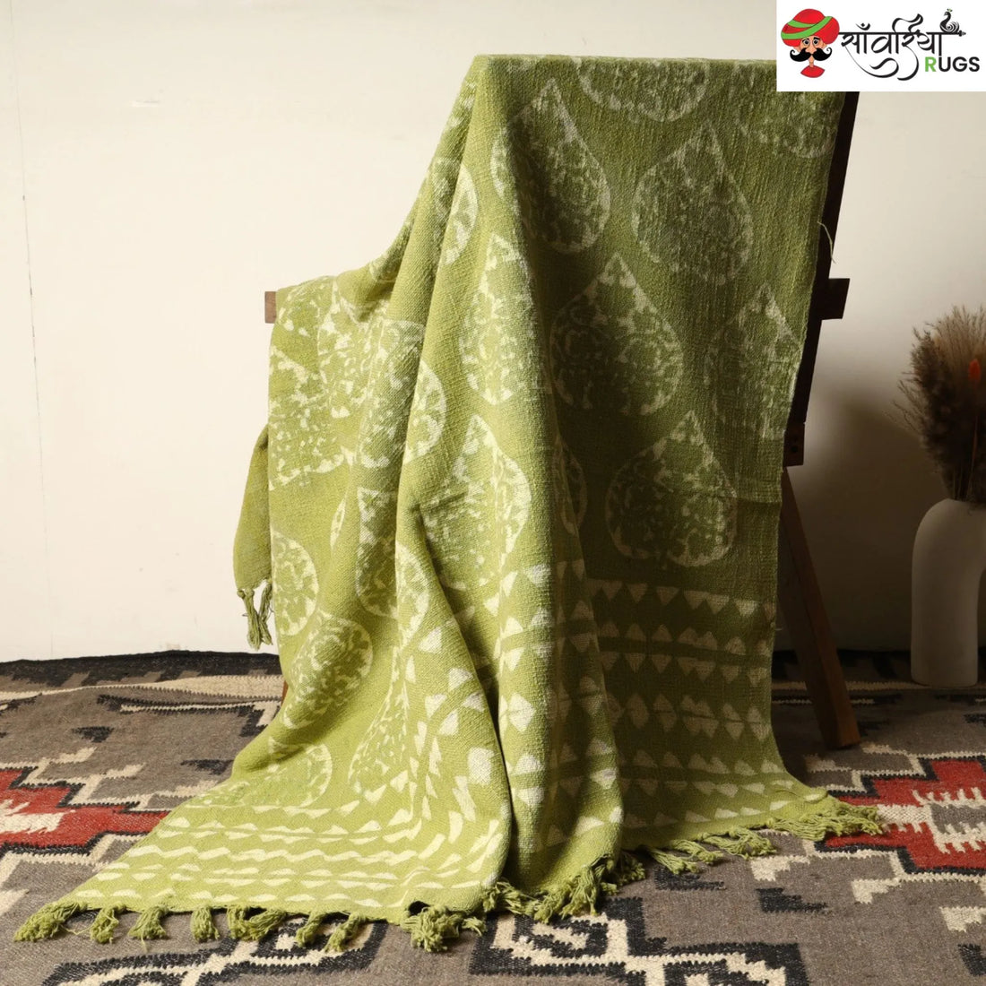 Green cotton throw blanket with traditional block print design