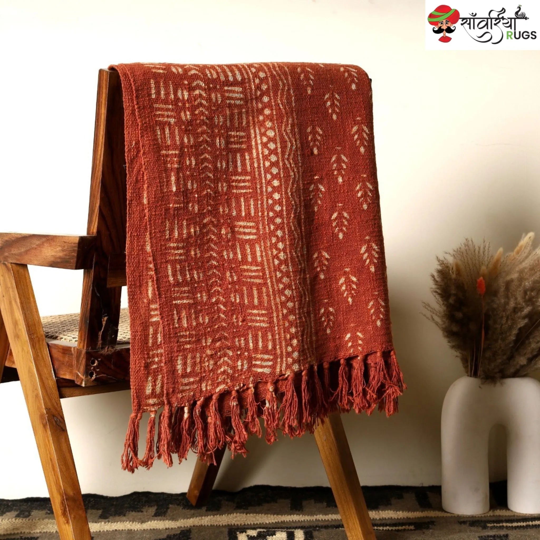Orange daabu print cotton throw blanket with hand block design