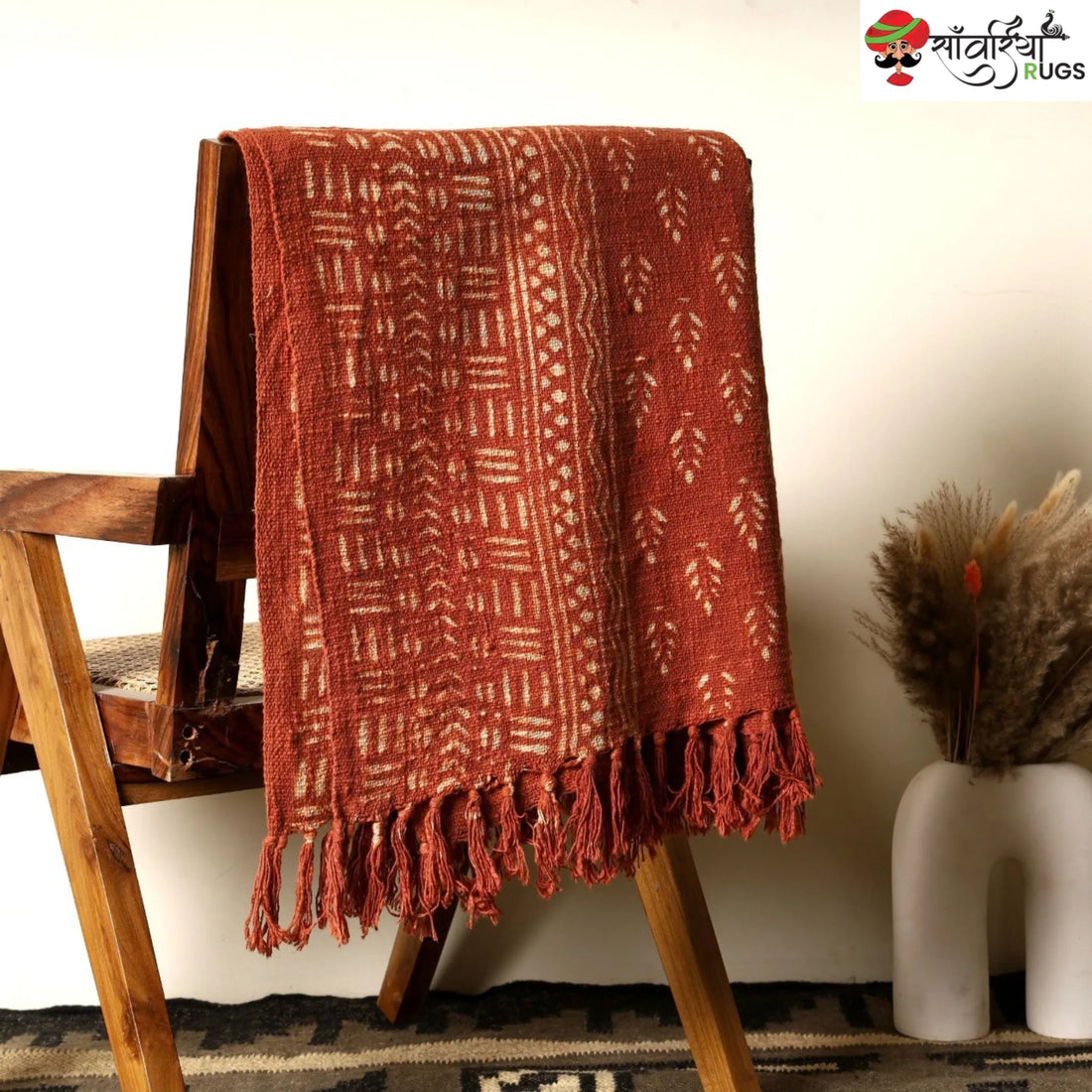 Orange daabu print cotton throw blanket with hand block design