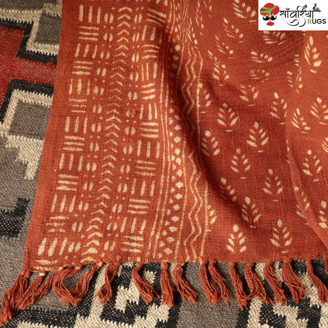 Orange daabu print cotton throw blanket with hand block design