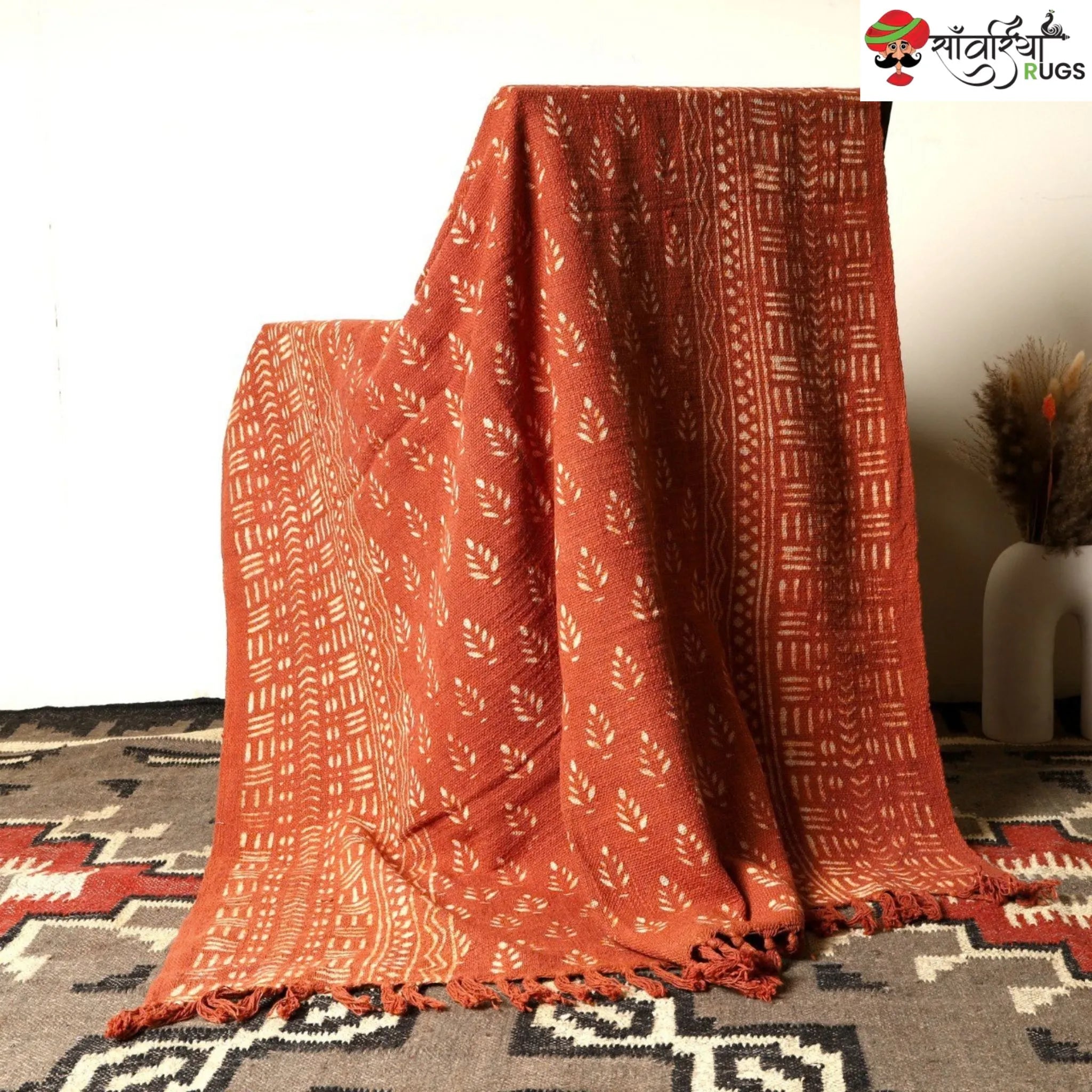 Orange daabu print cotton throw blanket with hand block design
