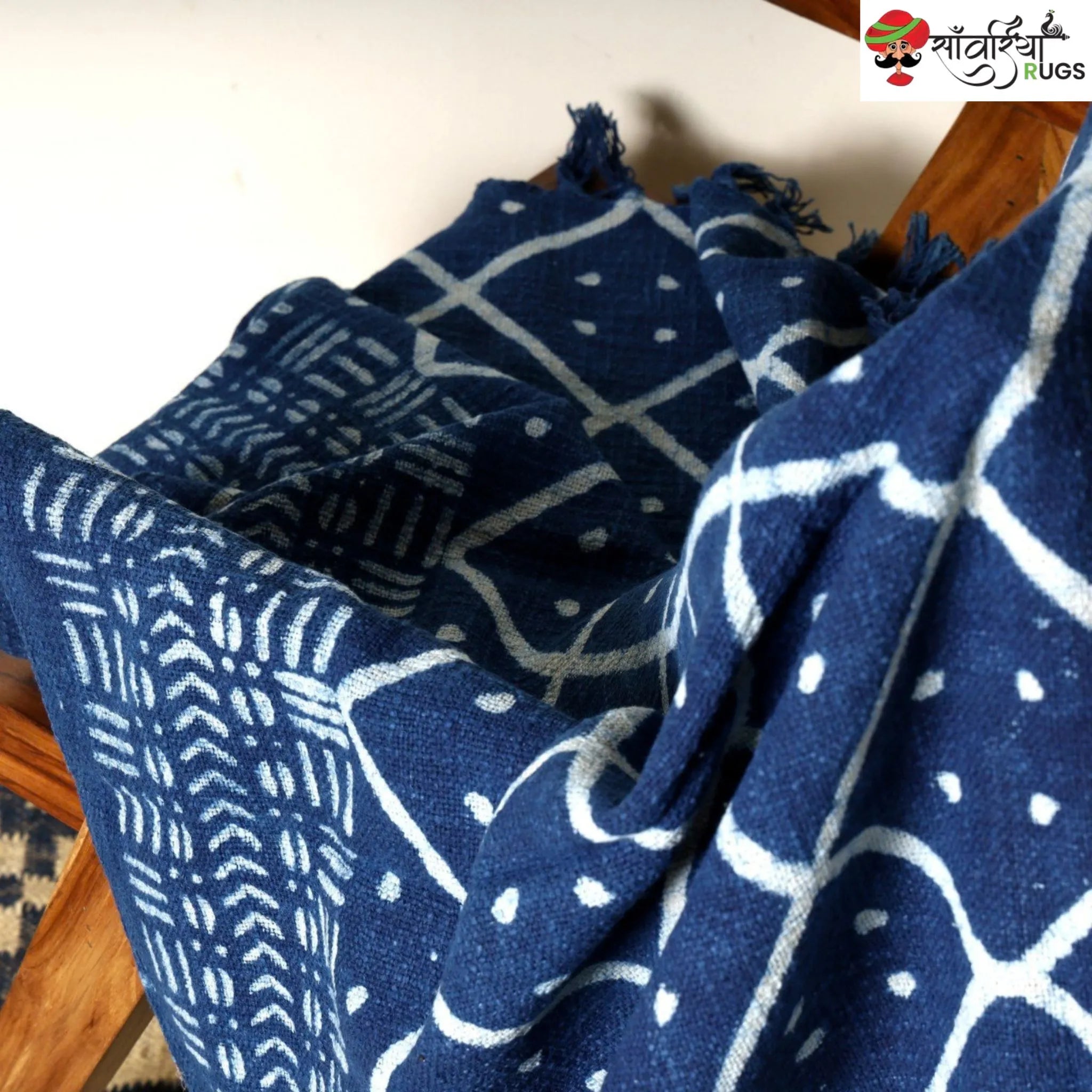 Hand block printed cotton throw blanket with geometric pattern