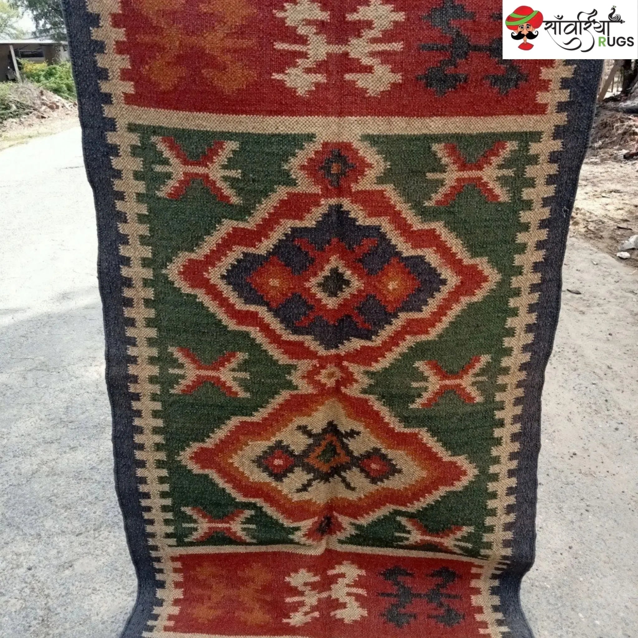 Handmade wool and jute kilim rug with geometric aztec pattern