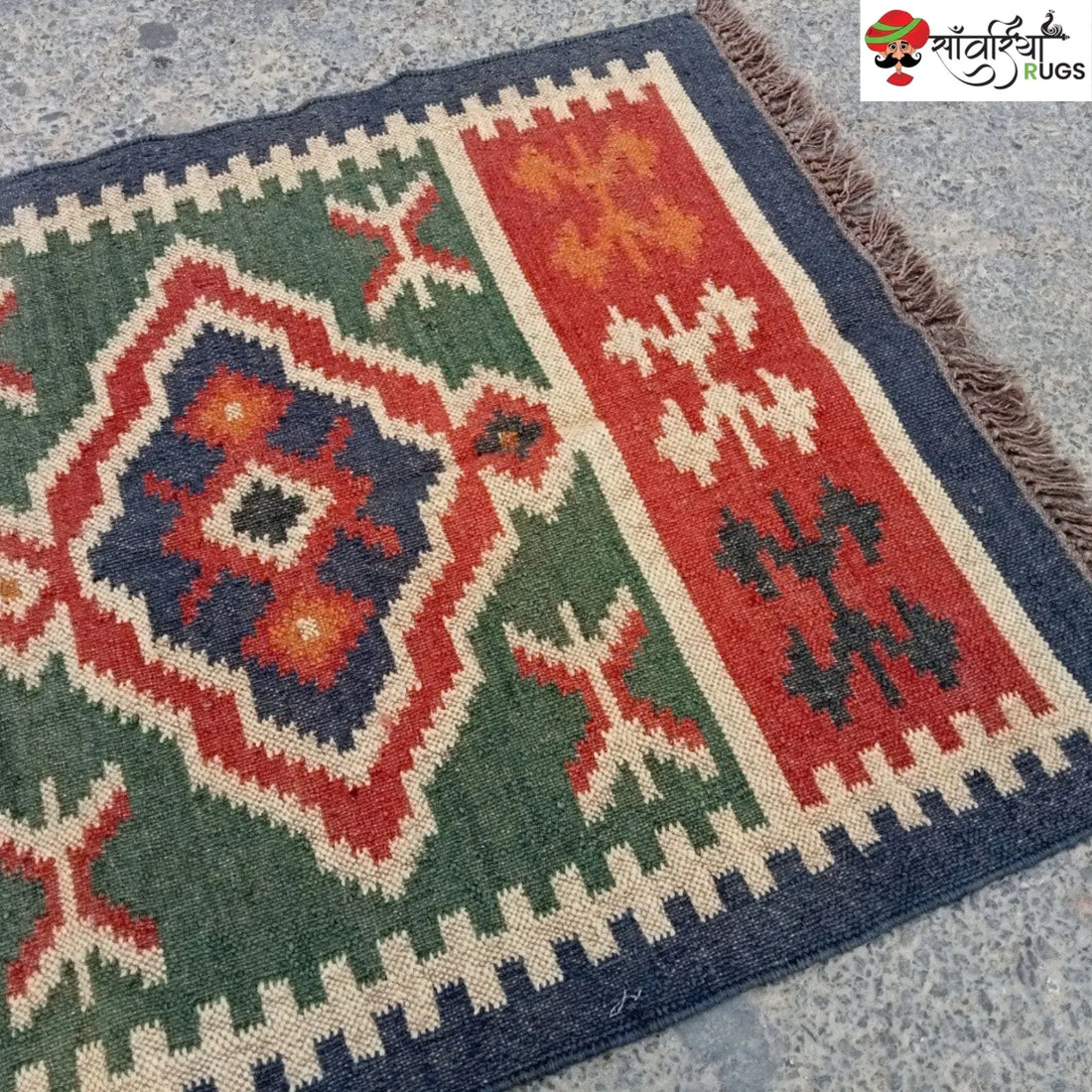 Handmade wool and jute kilim rug with geometric aztec pattern