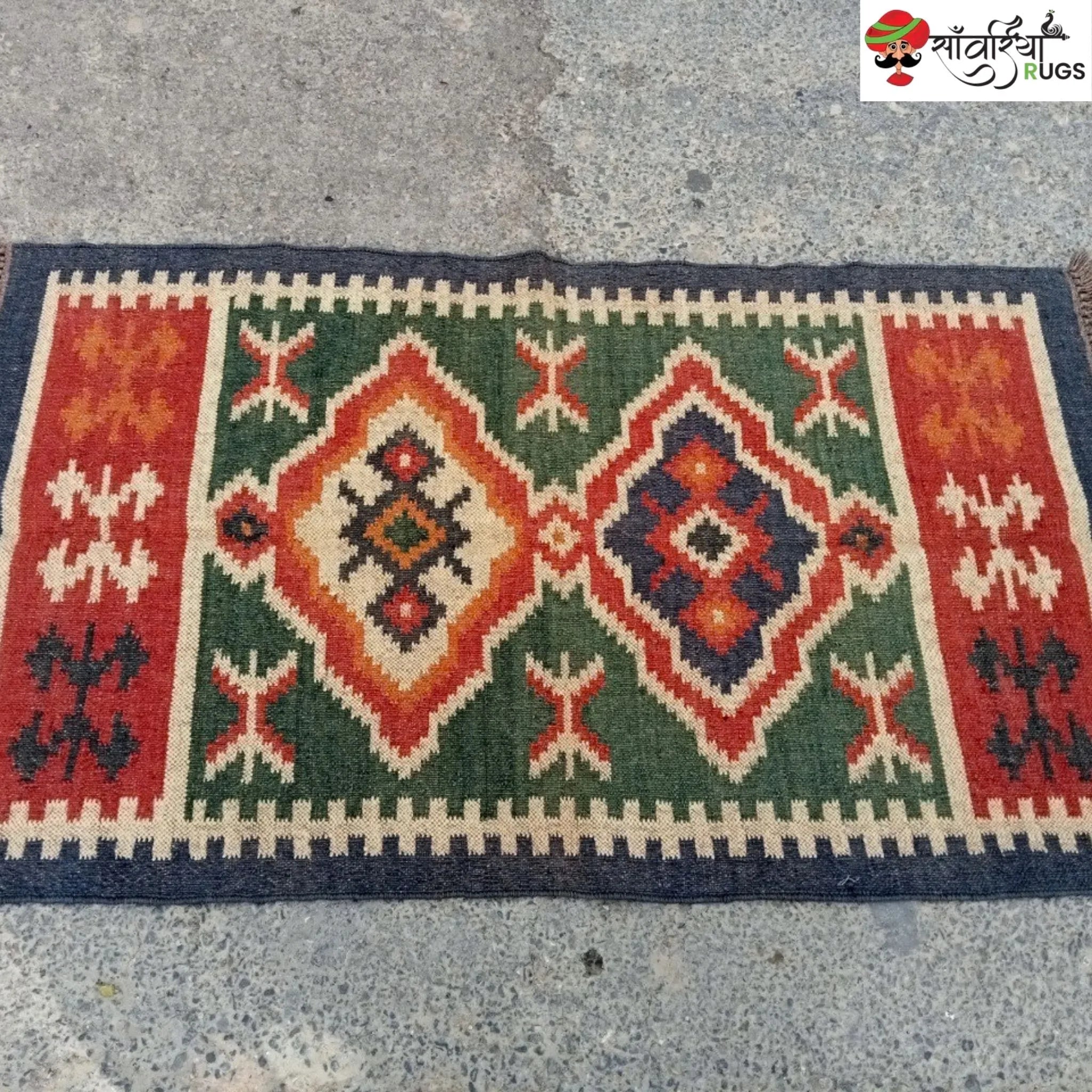 Handmade wool and jute kilim rug with geometric aztec pattern