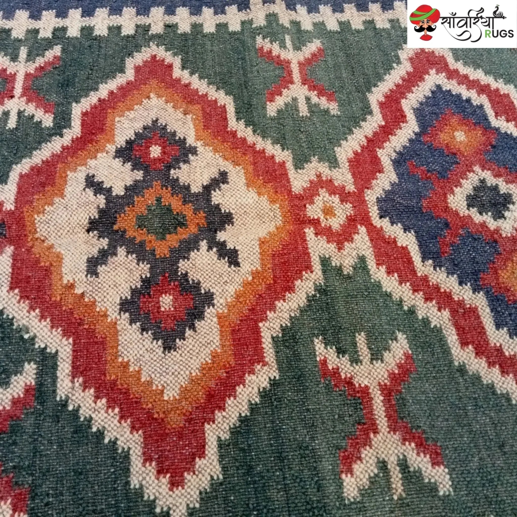 Handmade wool and jute kilim rug with geometric aztec pattern