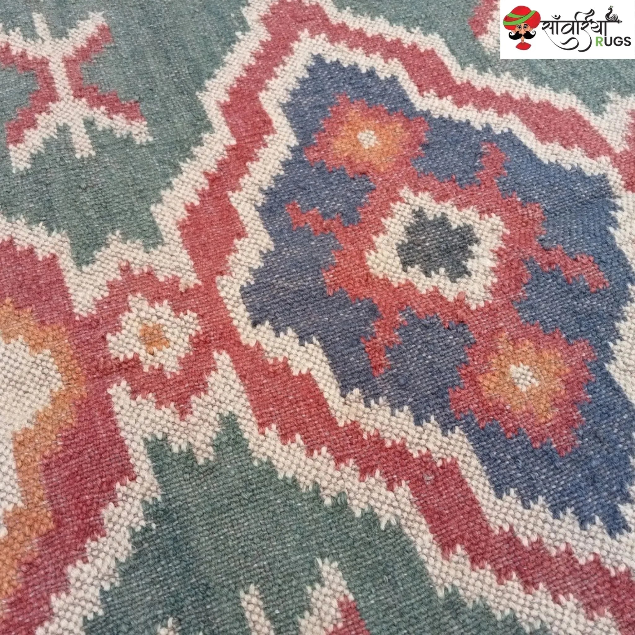 Handmade wool and jute kilim rug with geometric aztec pattern