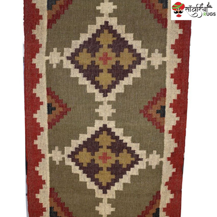 Handmade wool and jute kilim rug with traditional geometric design