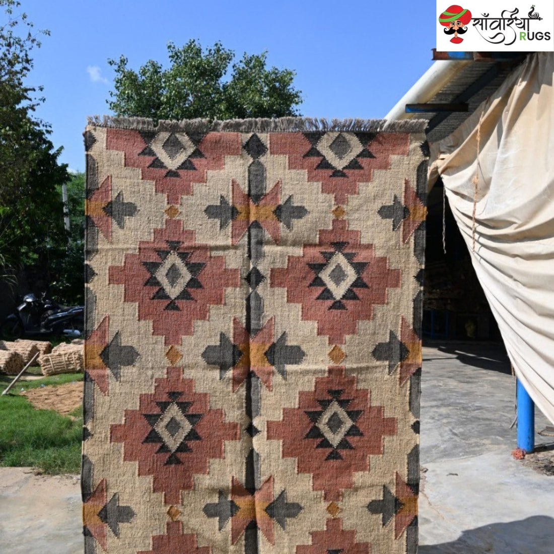 Handwoven wool jute kilim rug with tribal geometric pattern