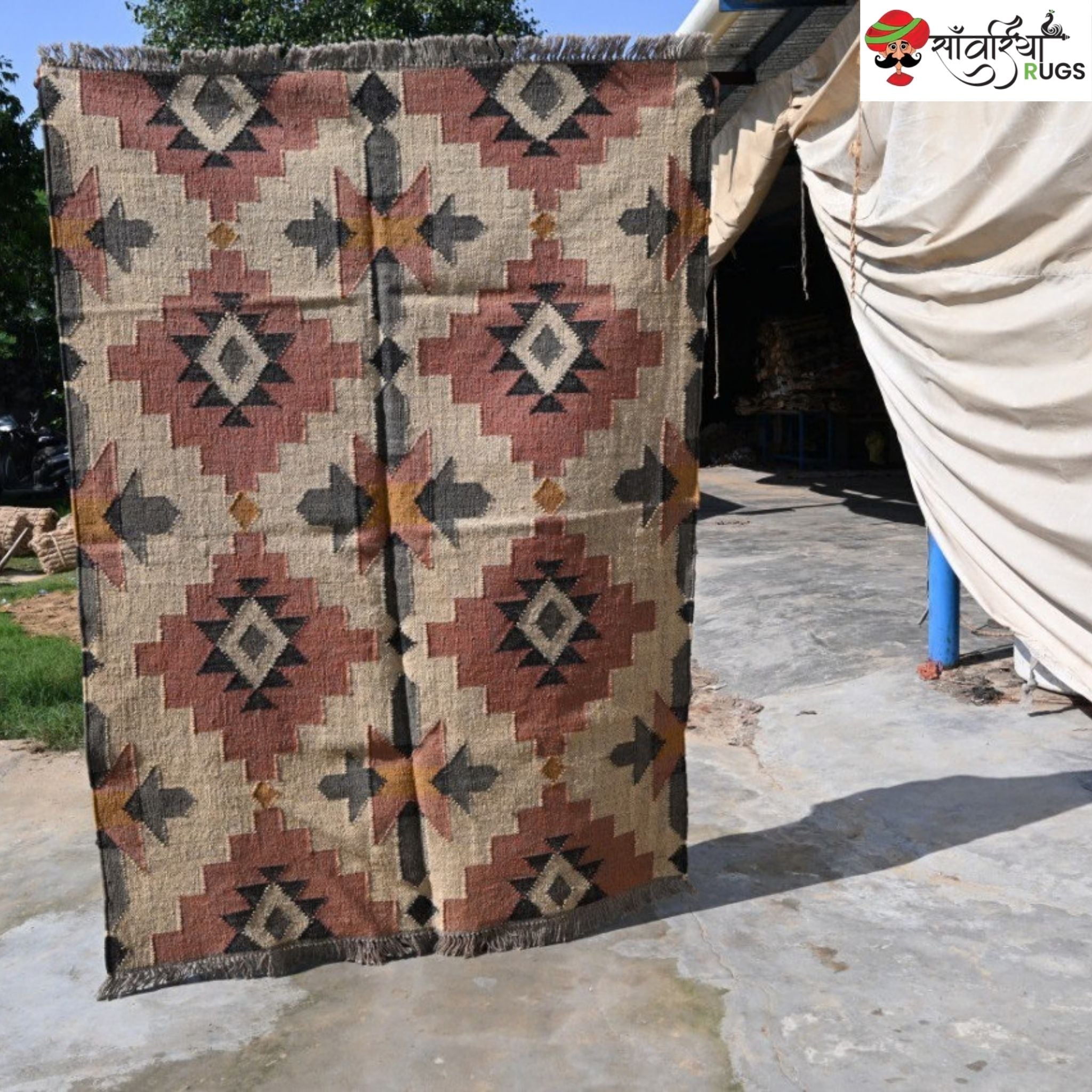 Handwoven wool jute kilim rug with tribal geometric pattern