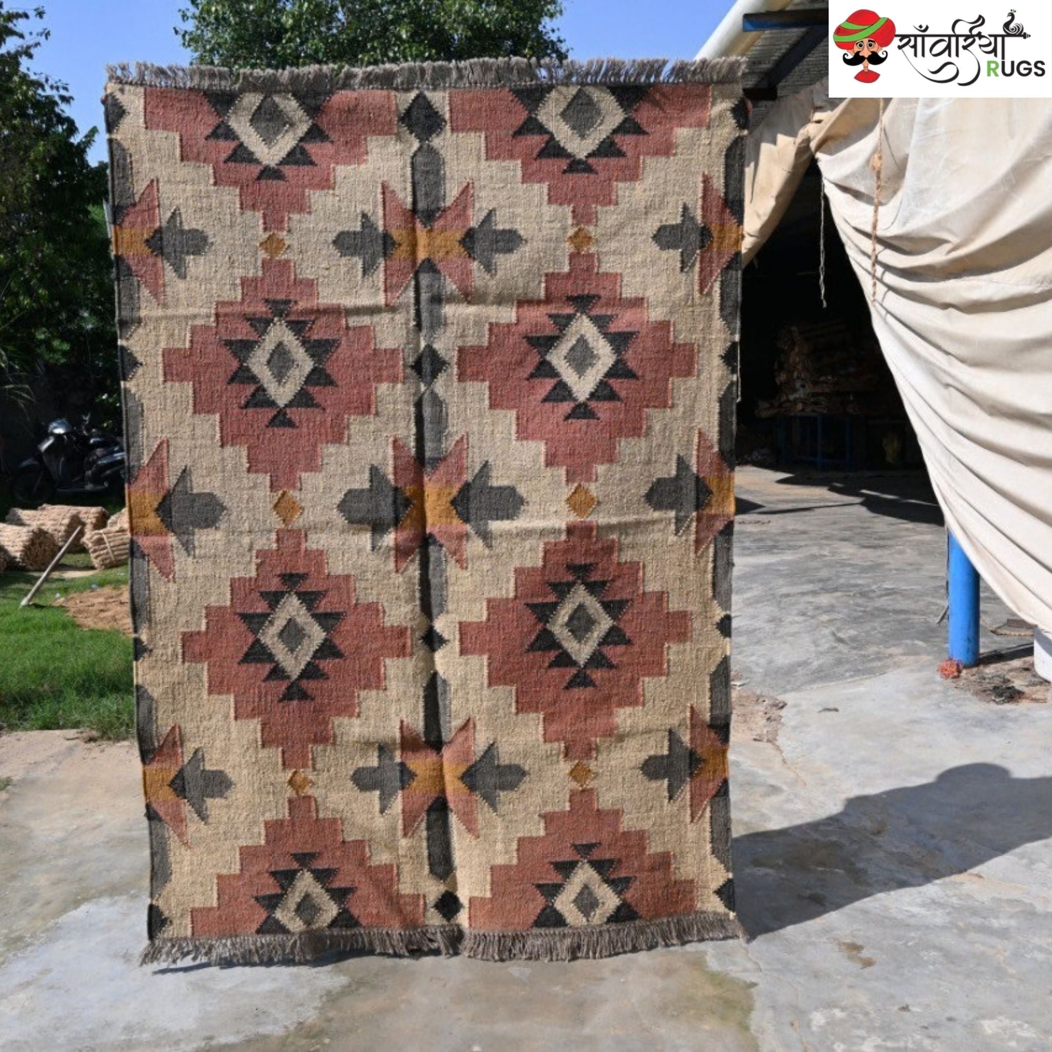 Handwoven wool jute kilim rug with tribal geometric pattern