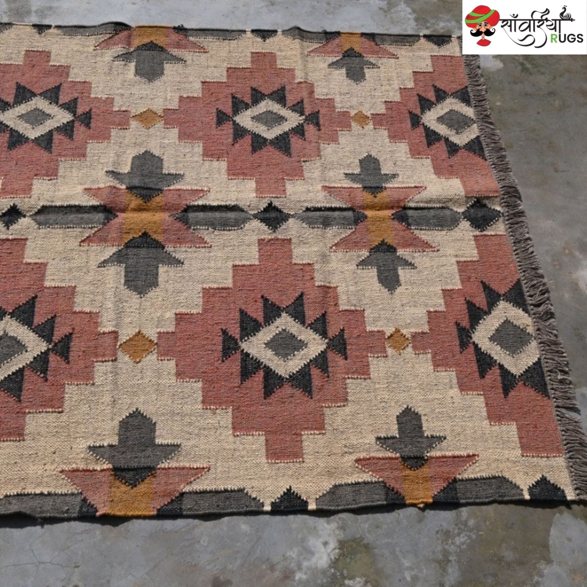 Handwoven wool jute kilim rug with tribal geometric pattern