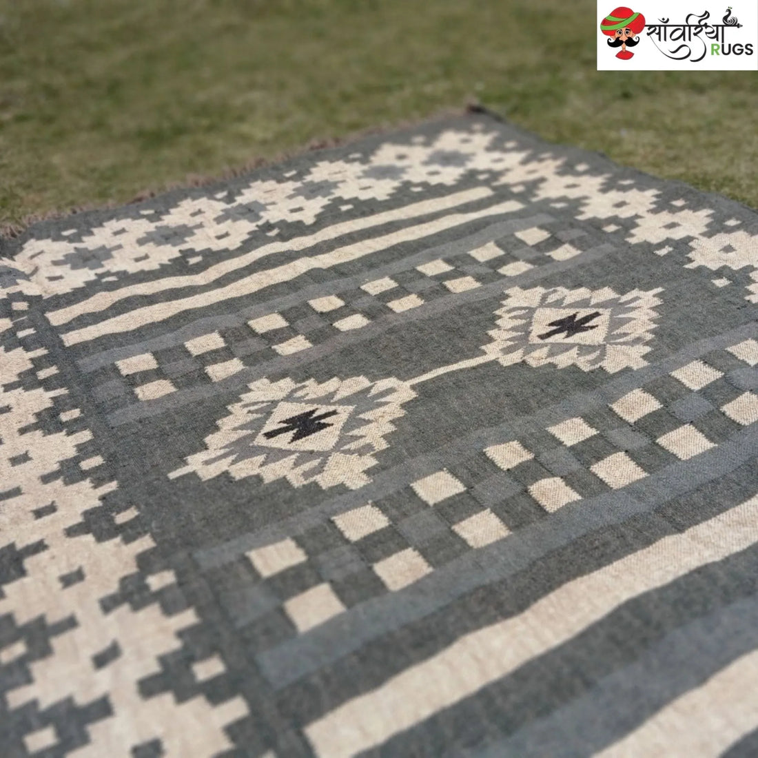 Handwoven wool and jute kilim durrie rug with geometric pattern
