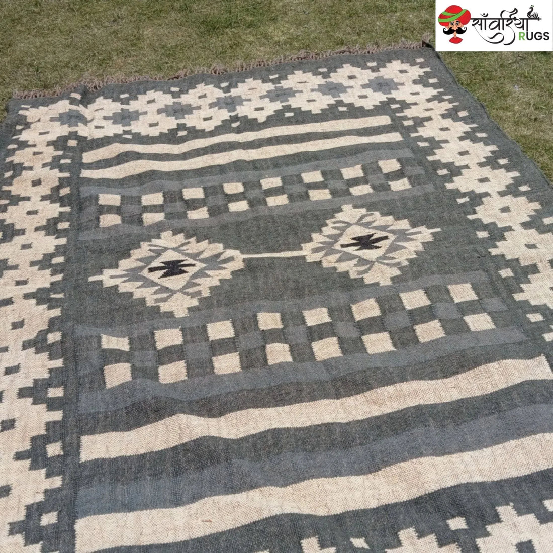 Handwoven wool and jute kilim durrie rug with geometric pattern