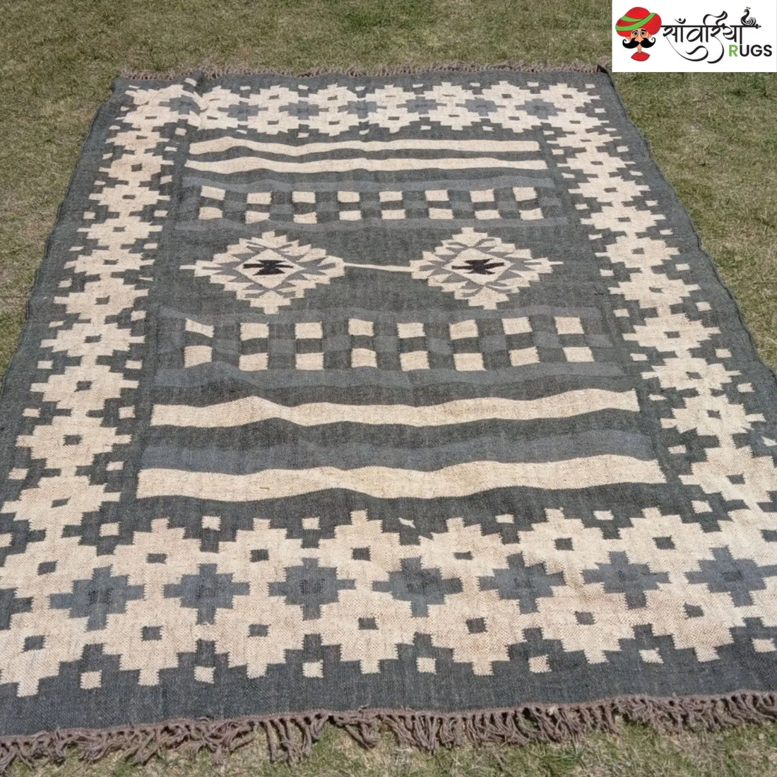 Handwoven wool and jute kilim durrie rug with geometric pattern
