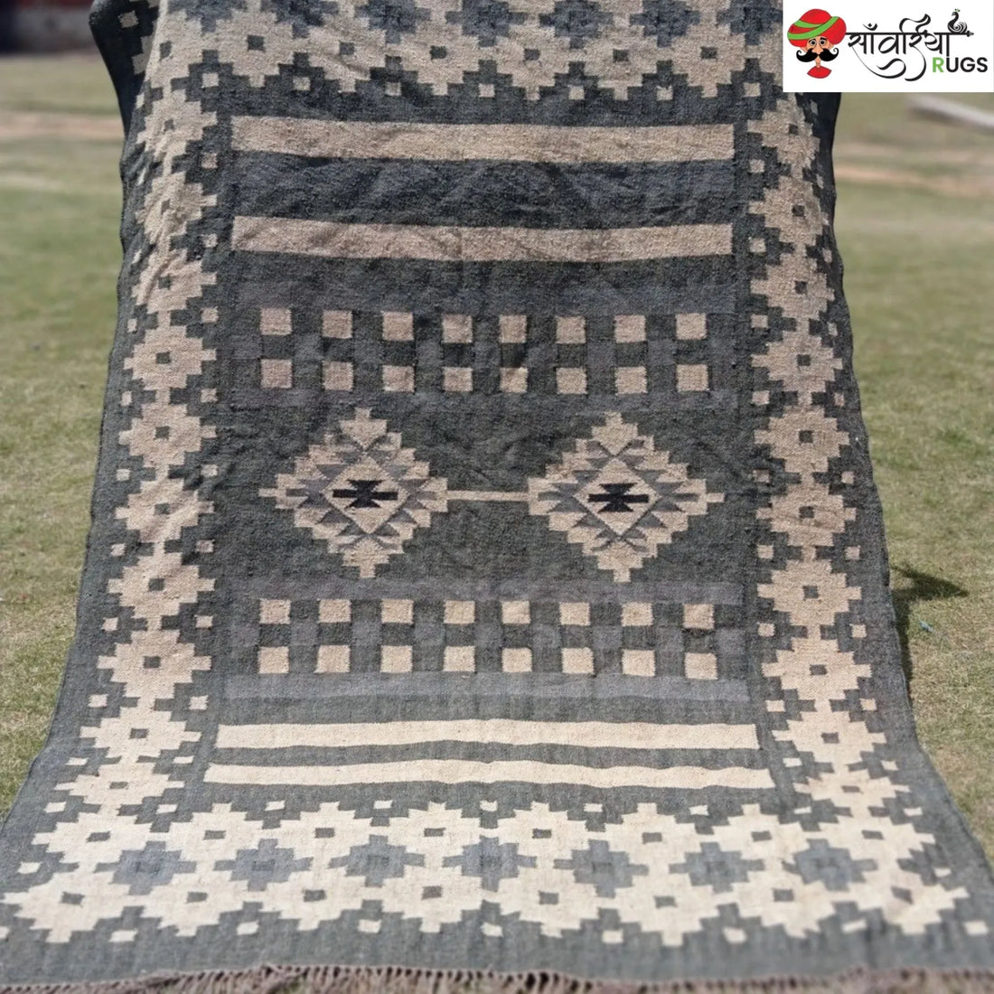 Handwoven wool and jute kilim durrie rug with geometric pattern