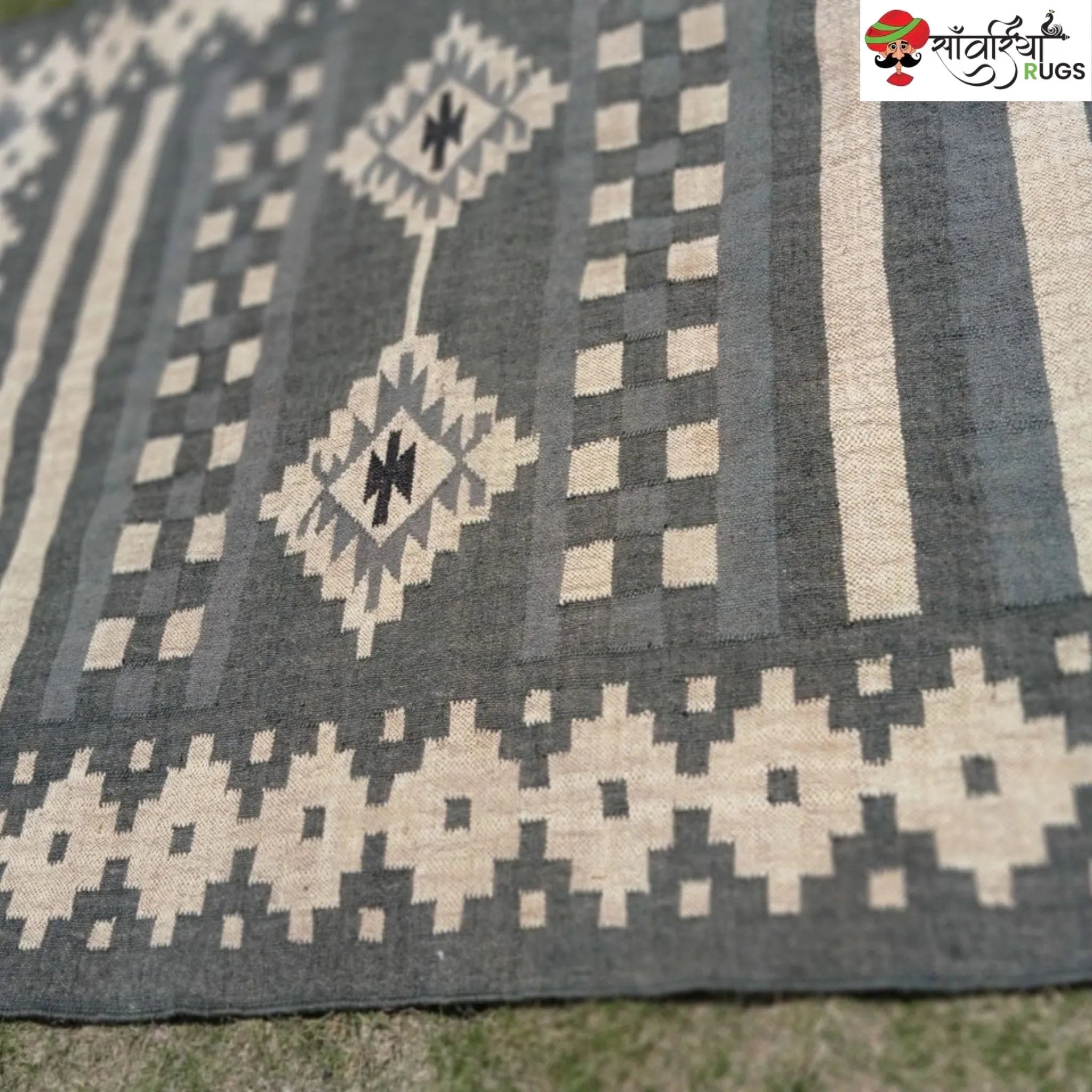 Handwoven wool and jute kilim durrie rug with geometric pattern
