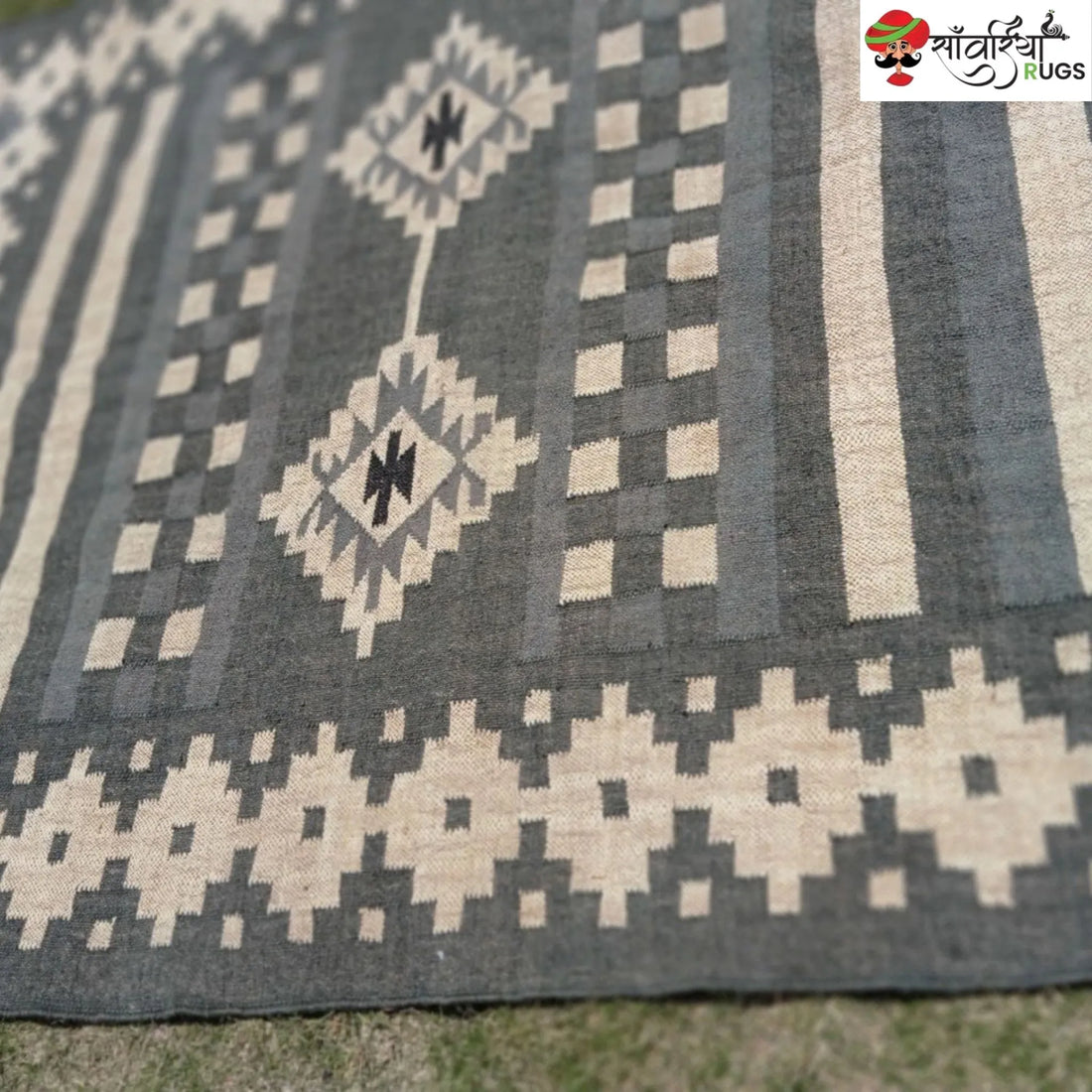 Handwoven wool and jute kilim durrie rug with geometric pattern