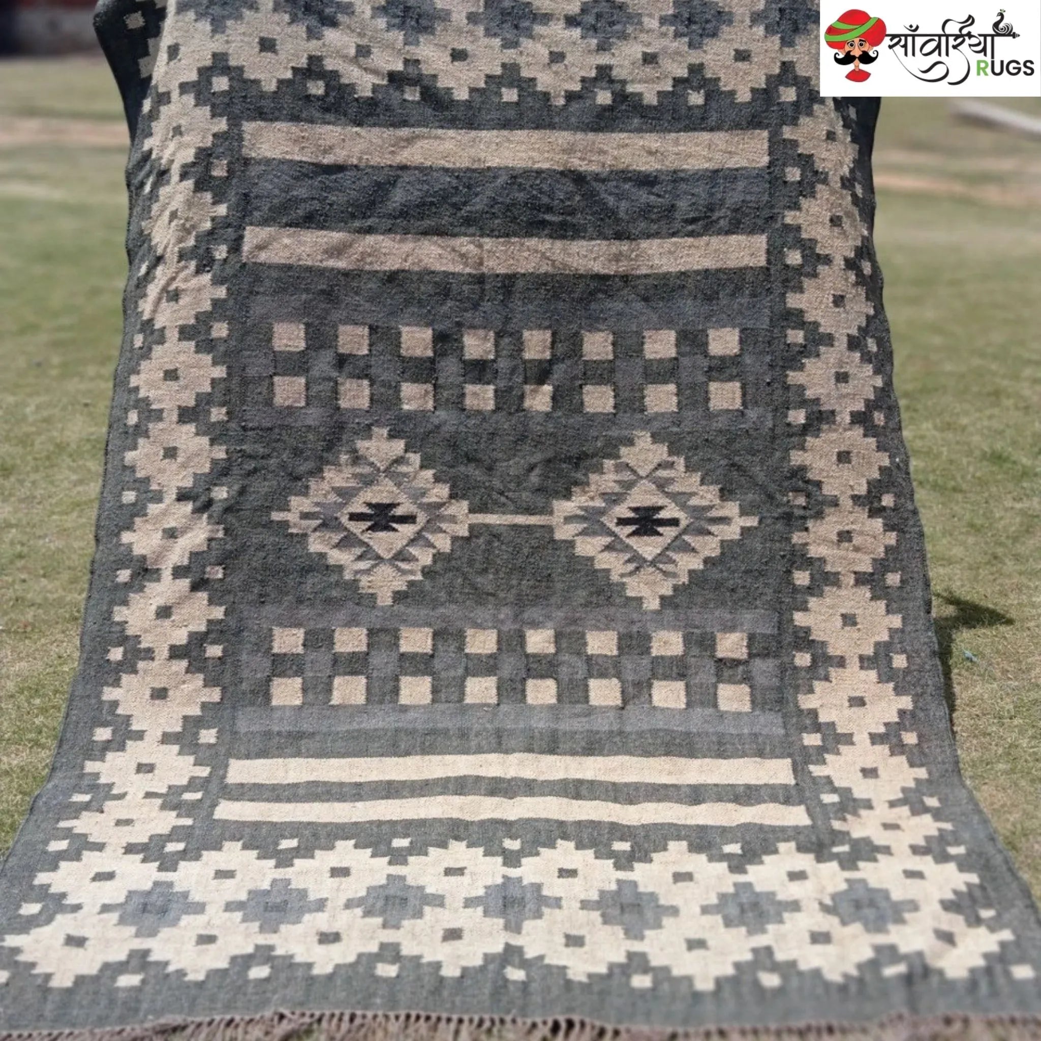 Handwoven wool and jute kilim durrie rug with geometric pattern