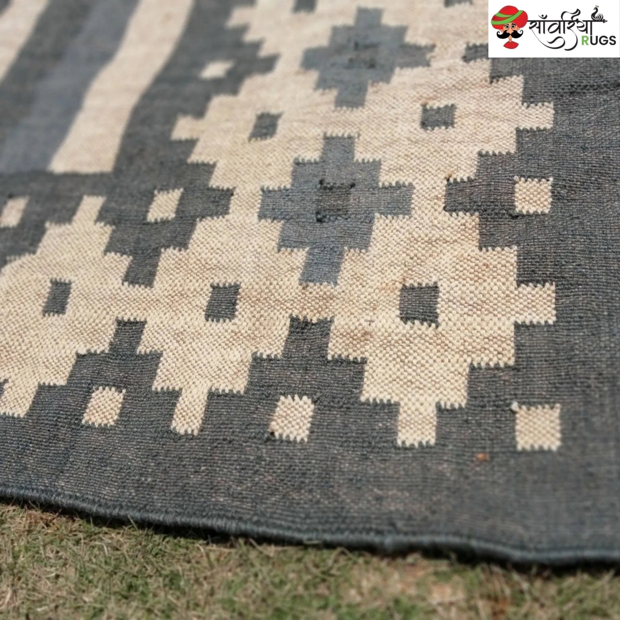 Handwoven wool and jute kilim durrie rug with geometric pattern